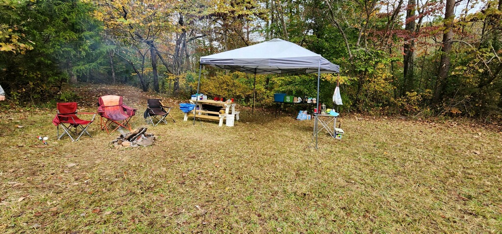 Looking at the camp facing the stream from the feild. 