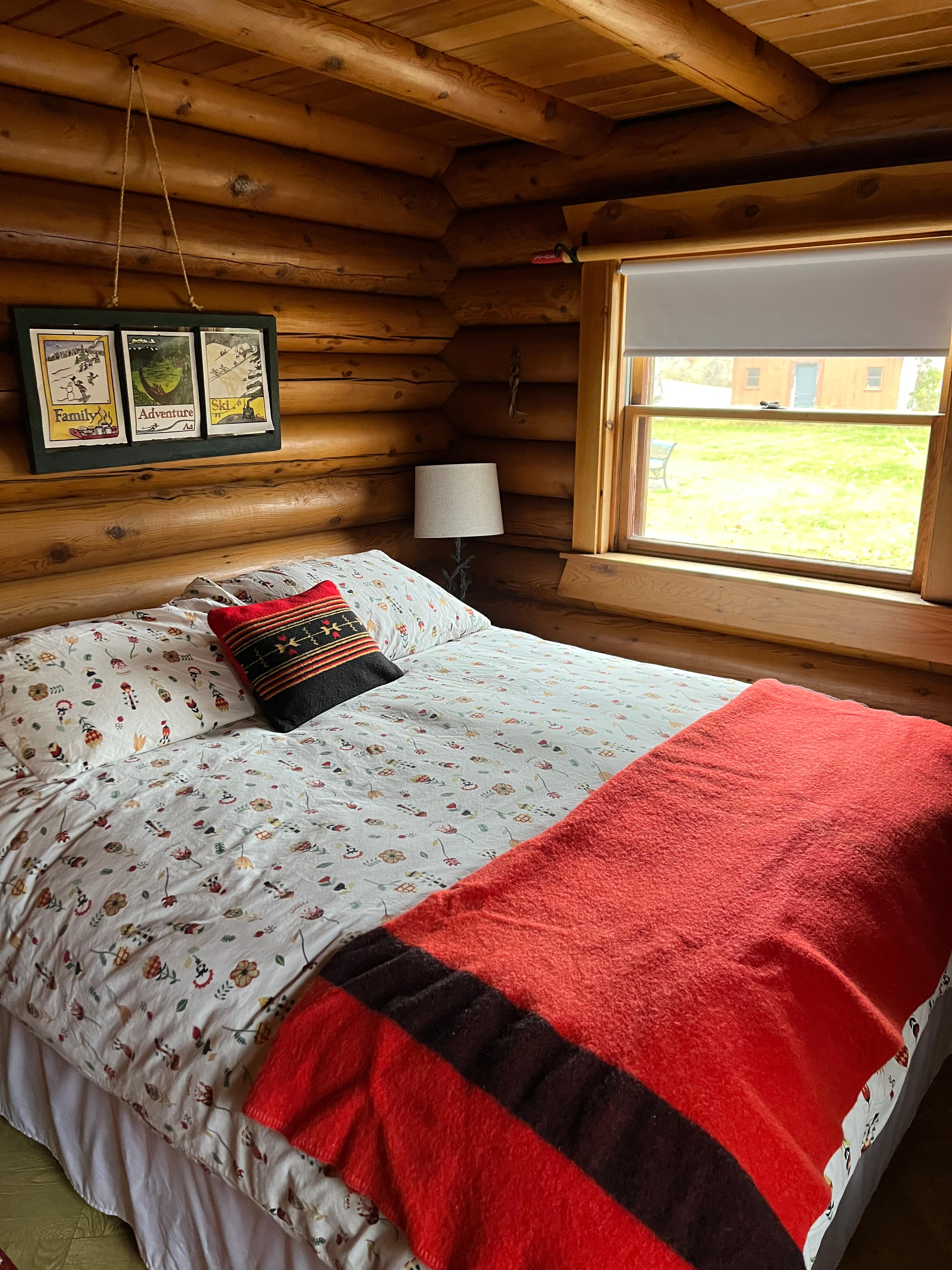 Main floor bedroom with queen bed (and en-suite bathroom!)