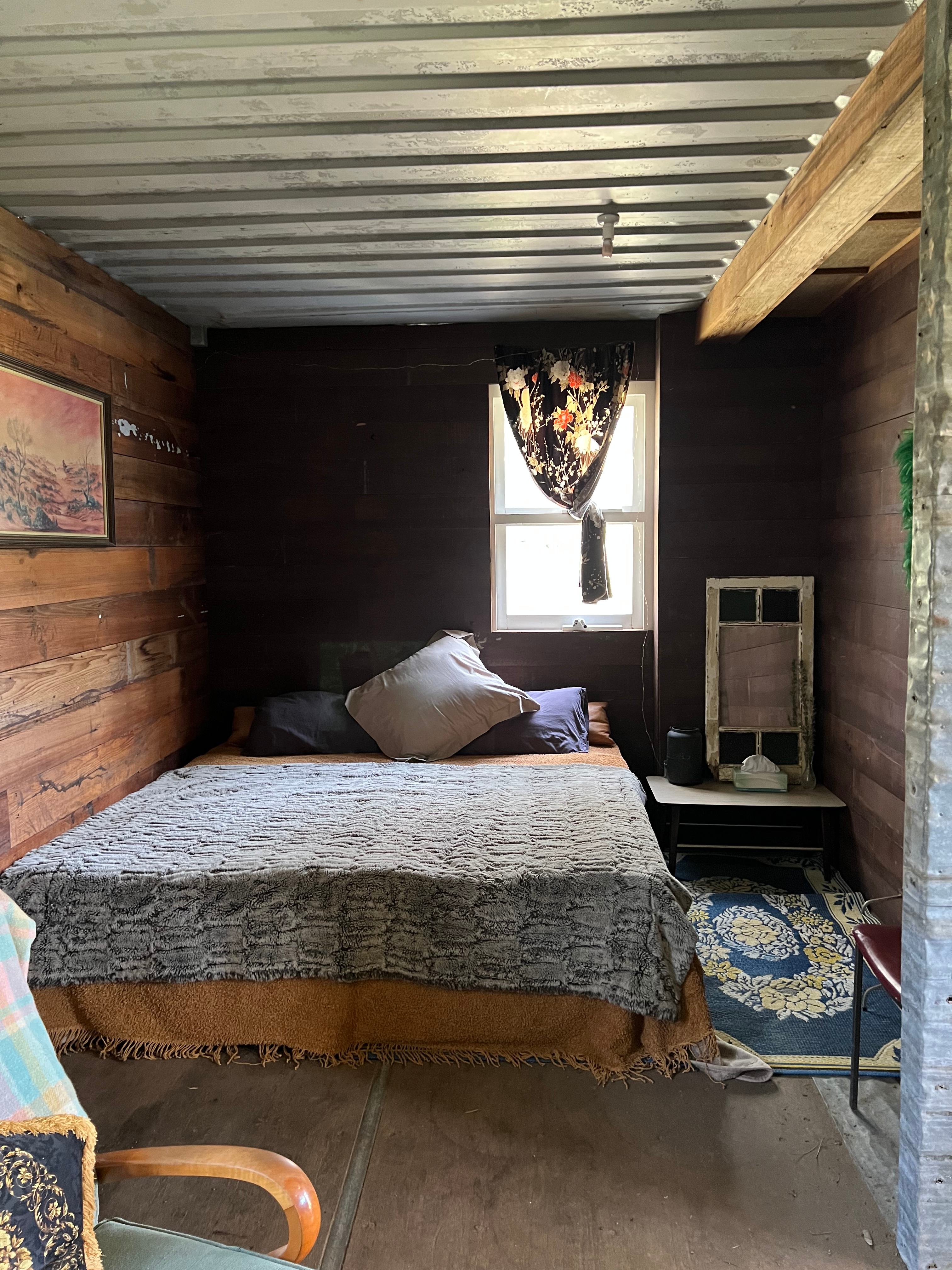 Bedroom with split king (2 single beds that can be split or pushed together to make a king) bedroom is open plan, no wall/doors.