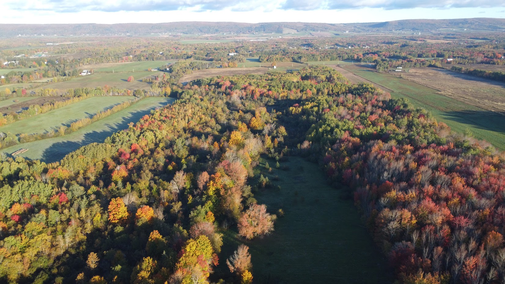 Ariel shot of our property & neighbouring properties looking towards North Moutain & Bay of Fundy. 