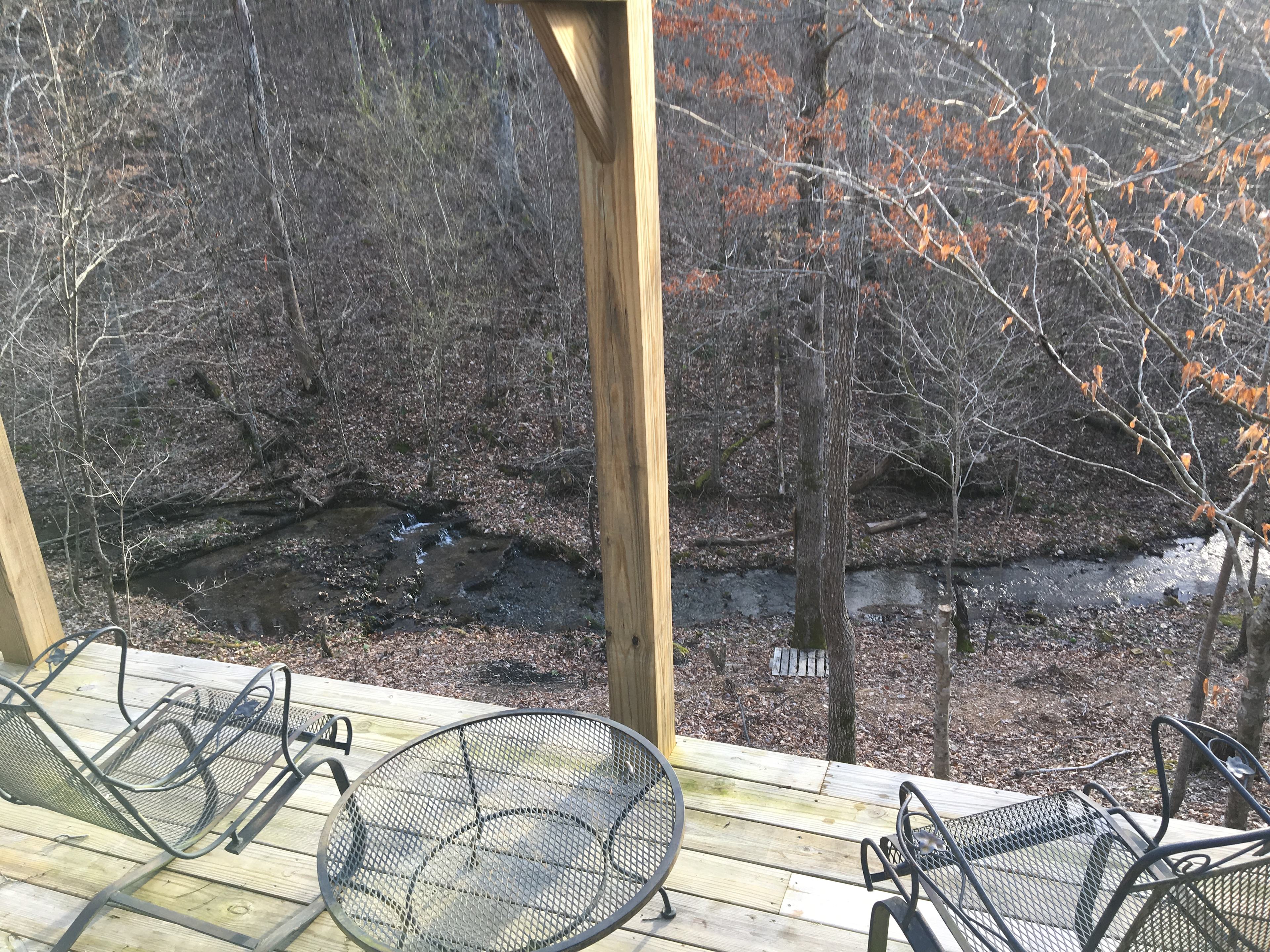 A deck with no railing above the spring in the winter.  All campsites have access.


