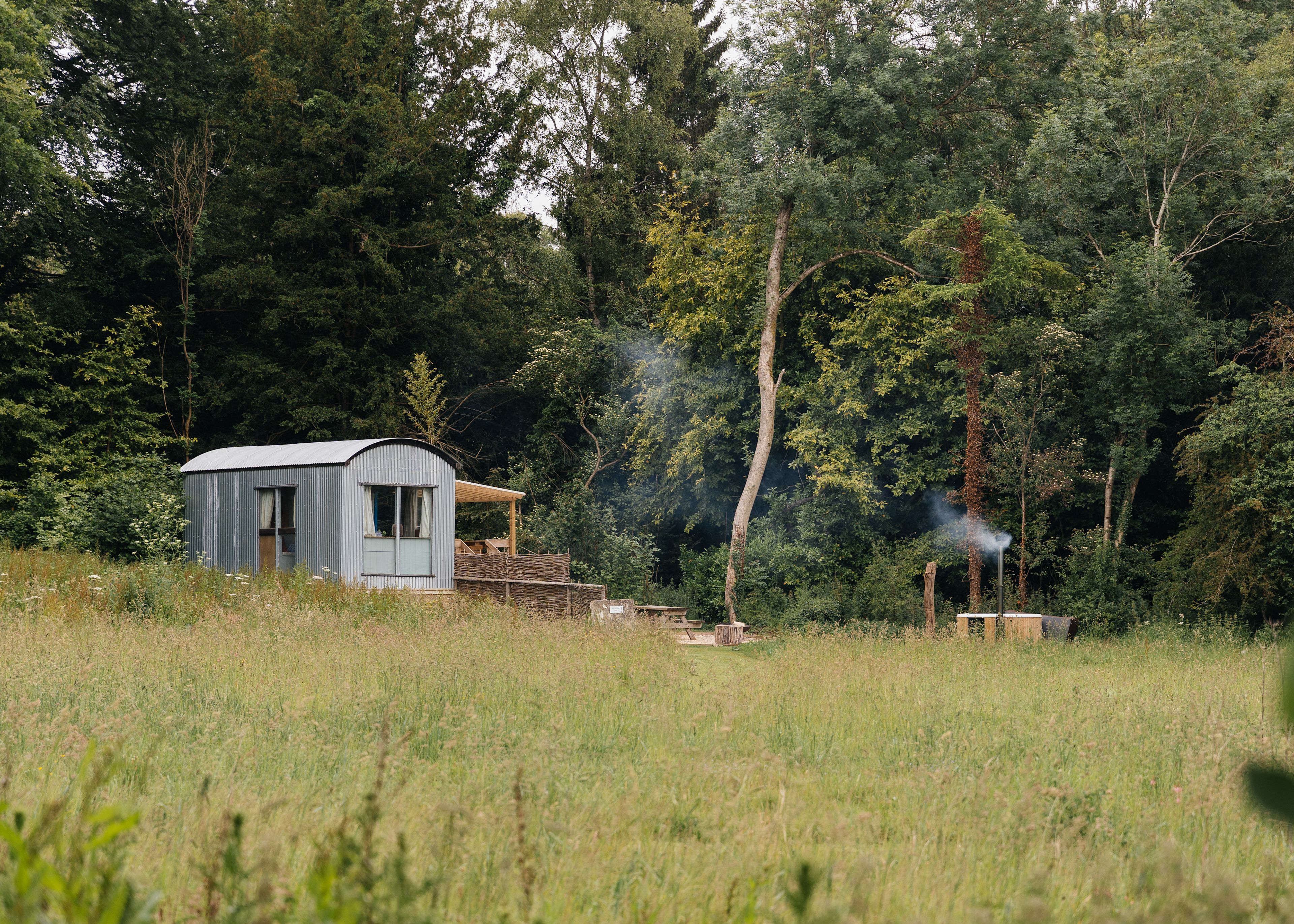 Bustard Hut sleeps 4 in a king-size bed and bunk-bed. It has it's own kitchen, bathroom and wood-fired hot-tub