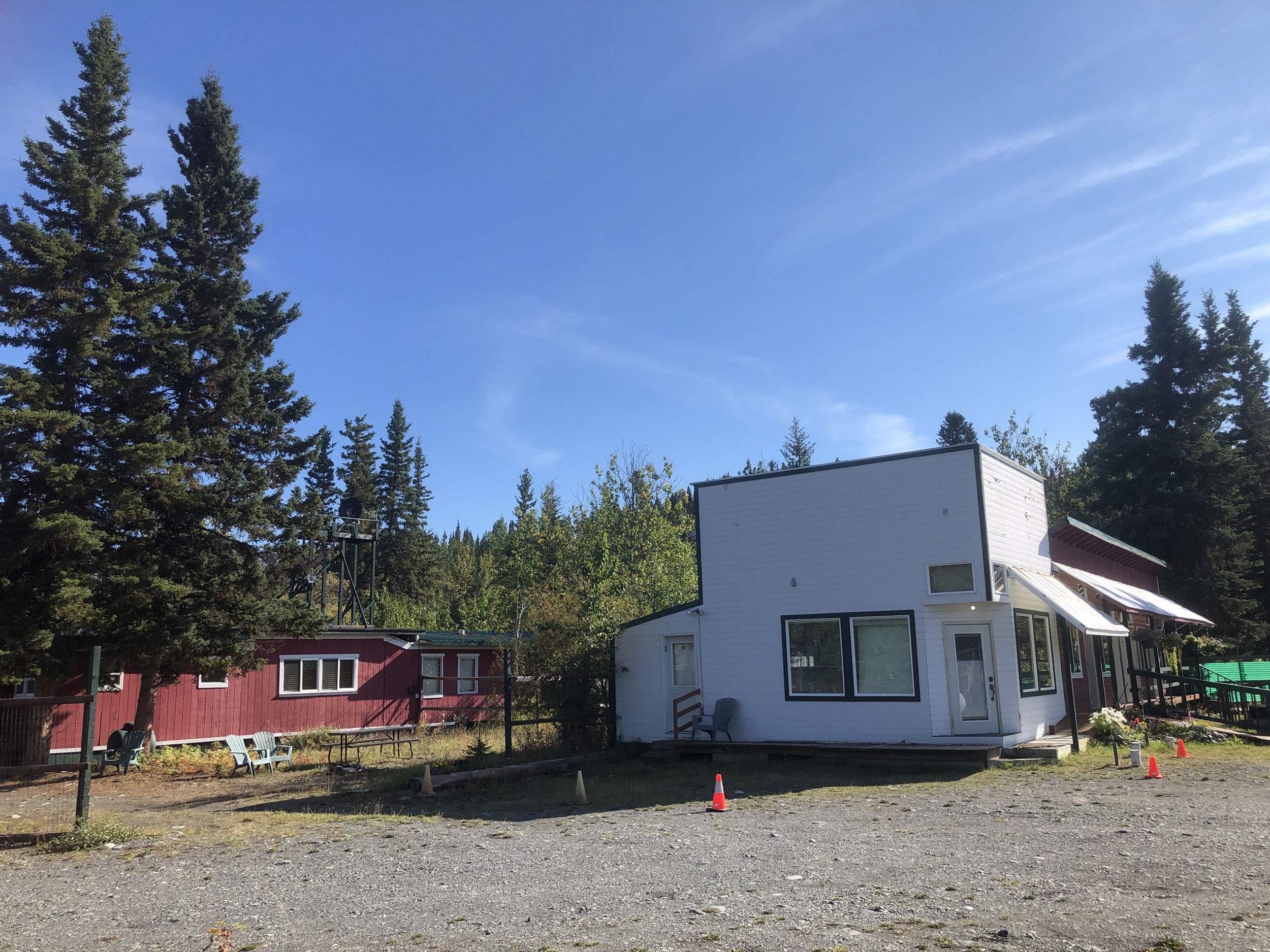 Room #5 is in the white storefront building. 