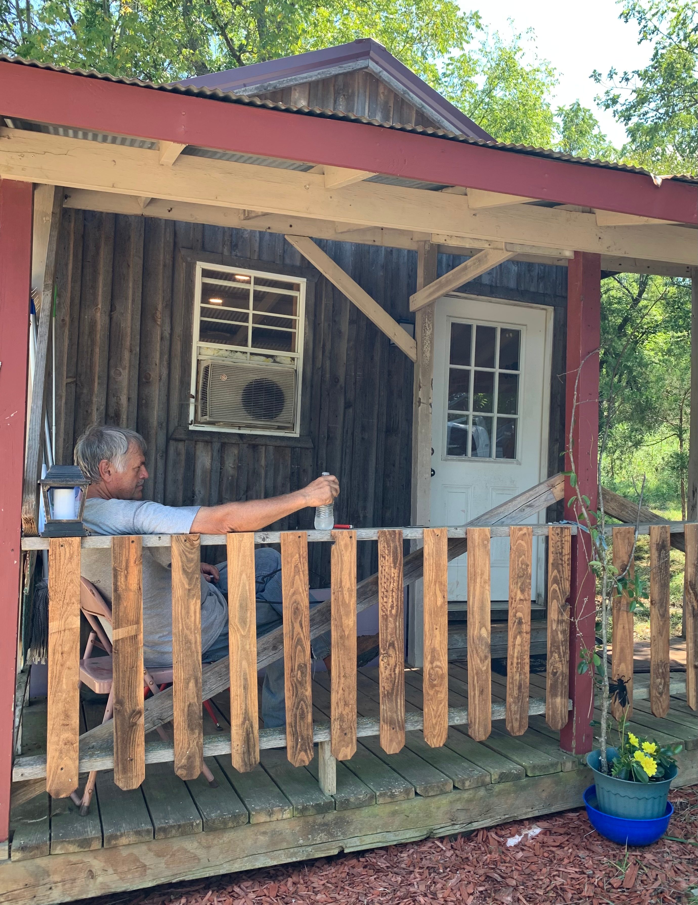 Tiny House #1 porch with table and chairs.