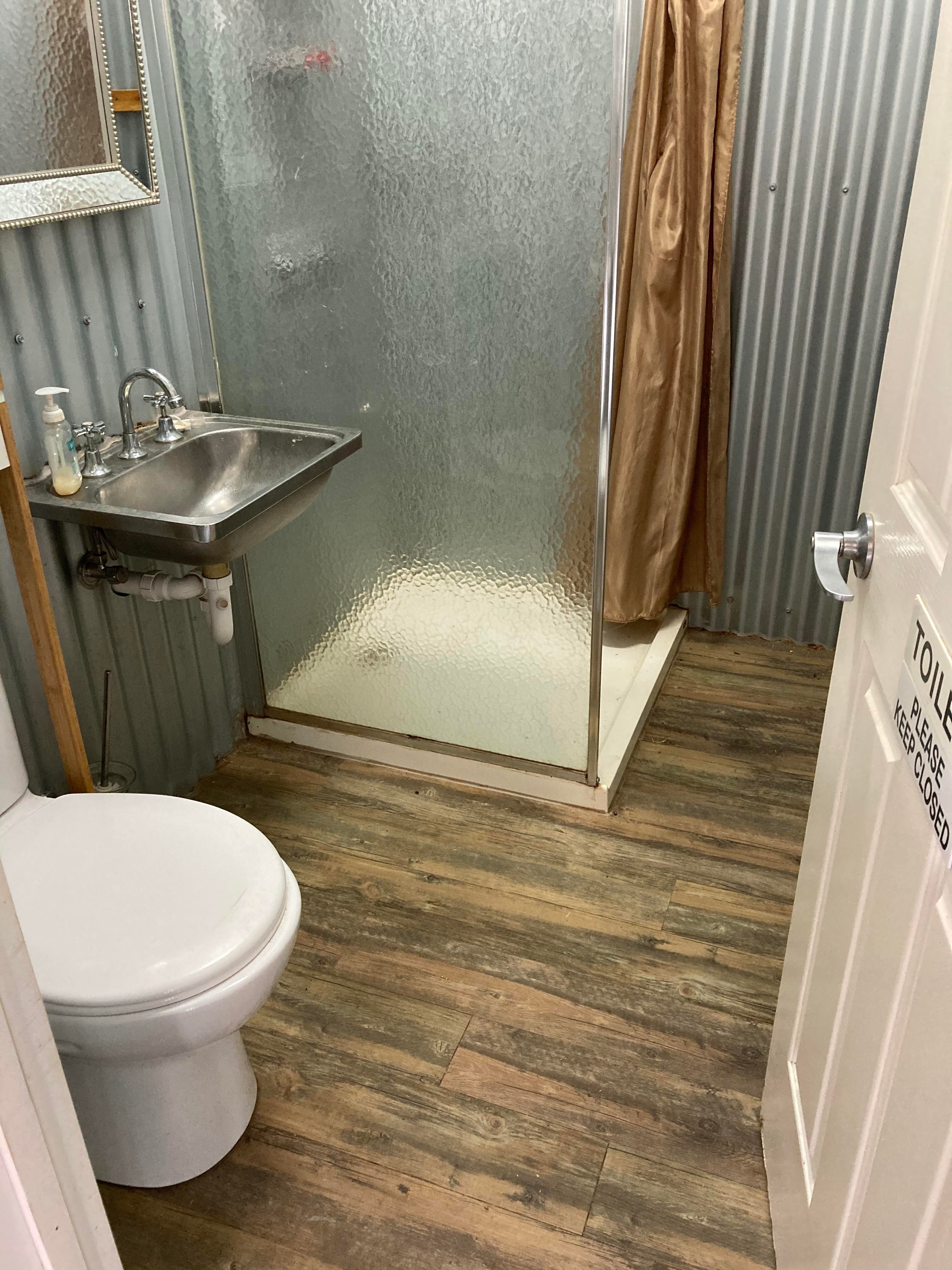 Clean bathroom and toilet area.