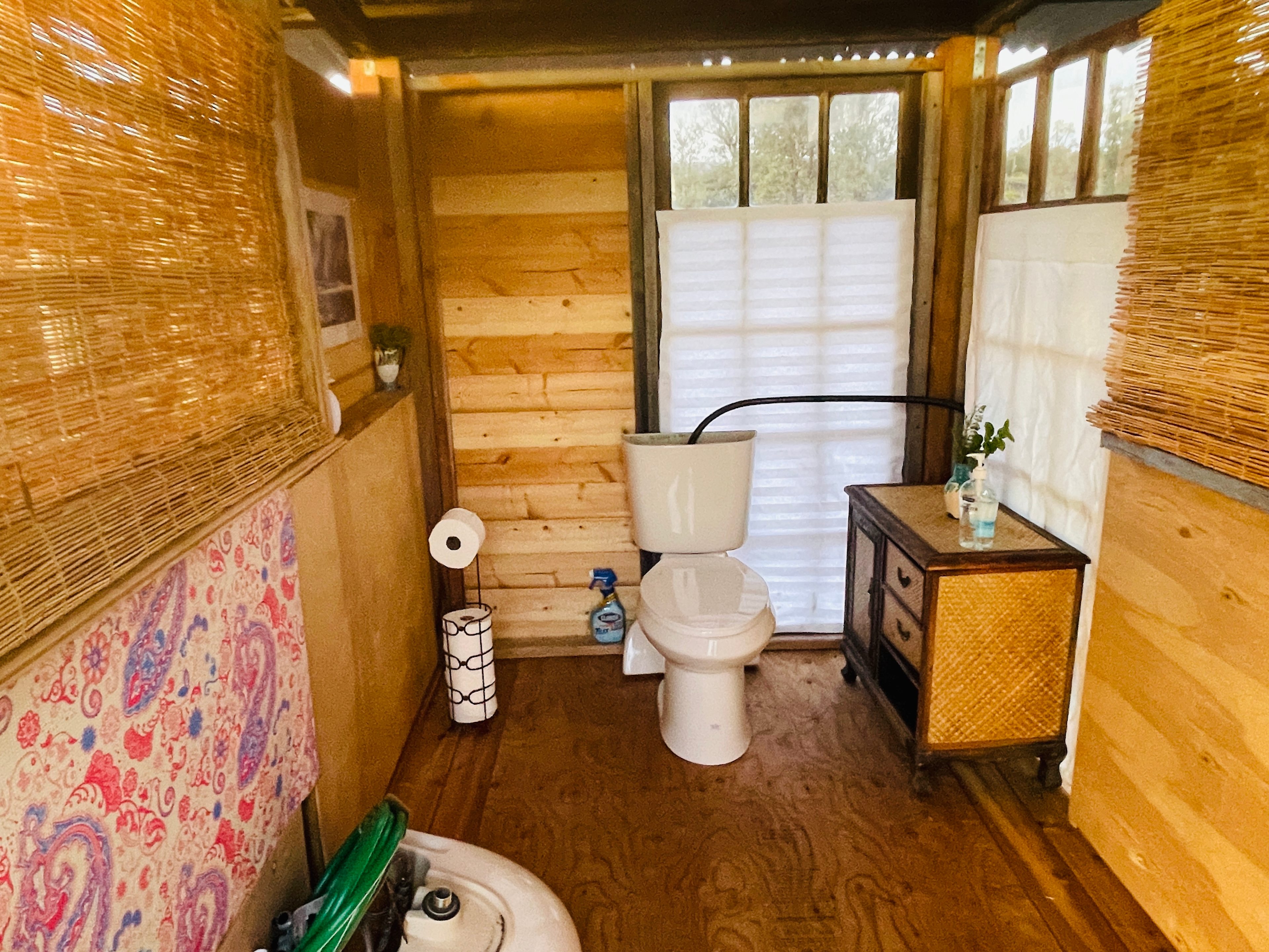 Your bathroom with a manual Phil flush toilet