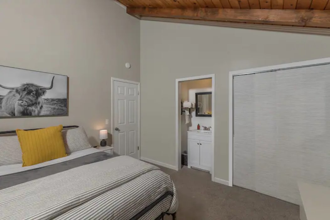 The second bedroom is a mini-master bedroom complete with queen bed, black-out shades, USB enabled nightstands, his/hers closets and private sink.