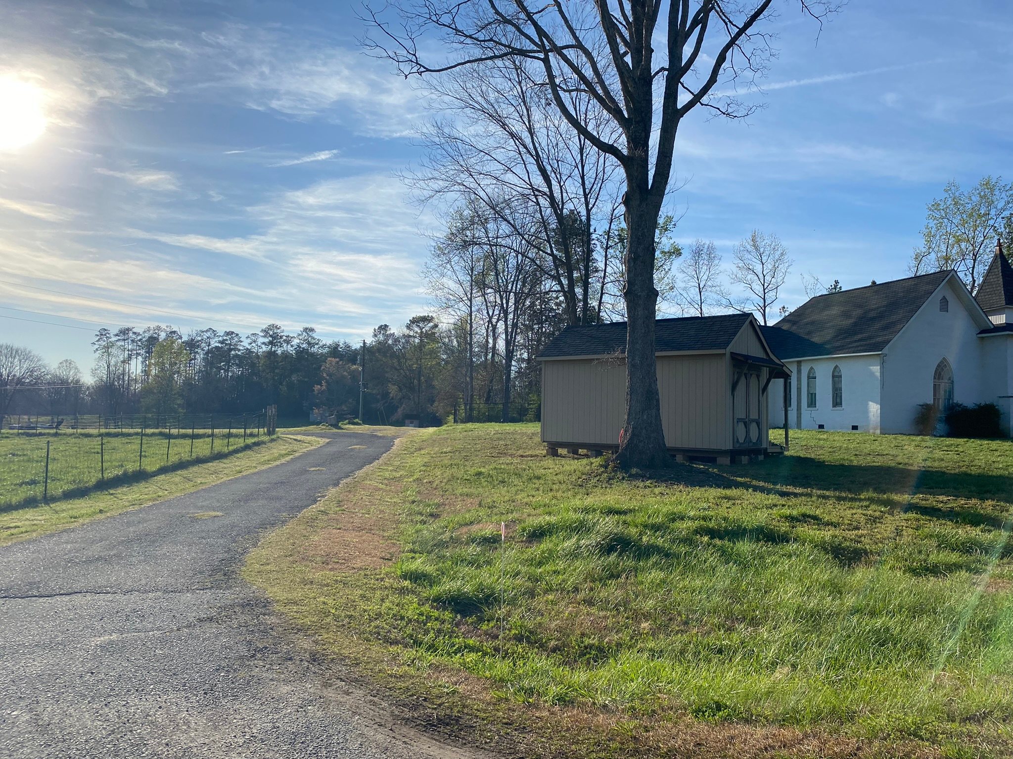 Entrance into drive toward site