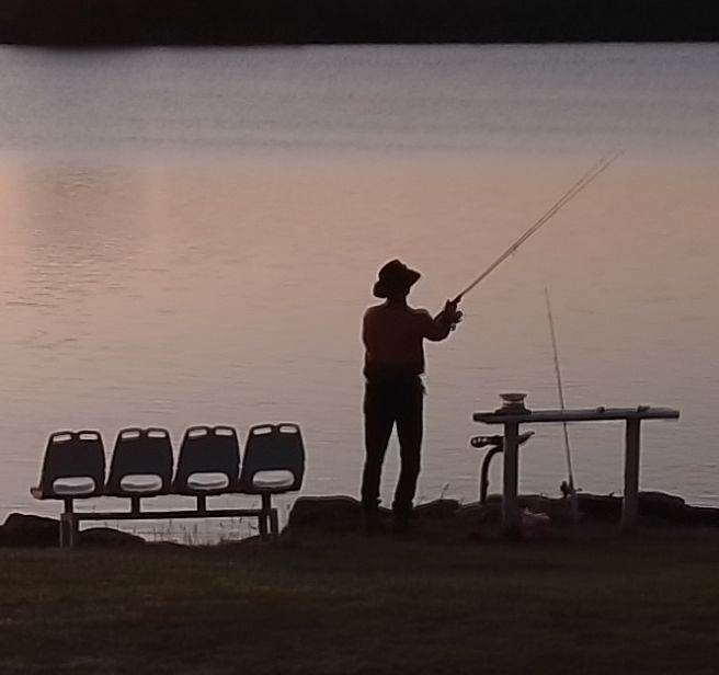 Squigs getting in an early morning fish before heading off to work....(Outside his home close to the hipcamp site)