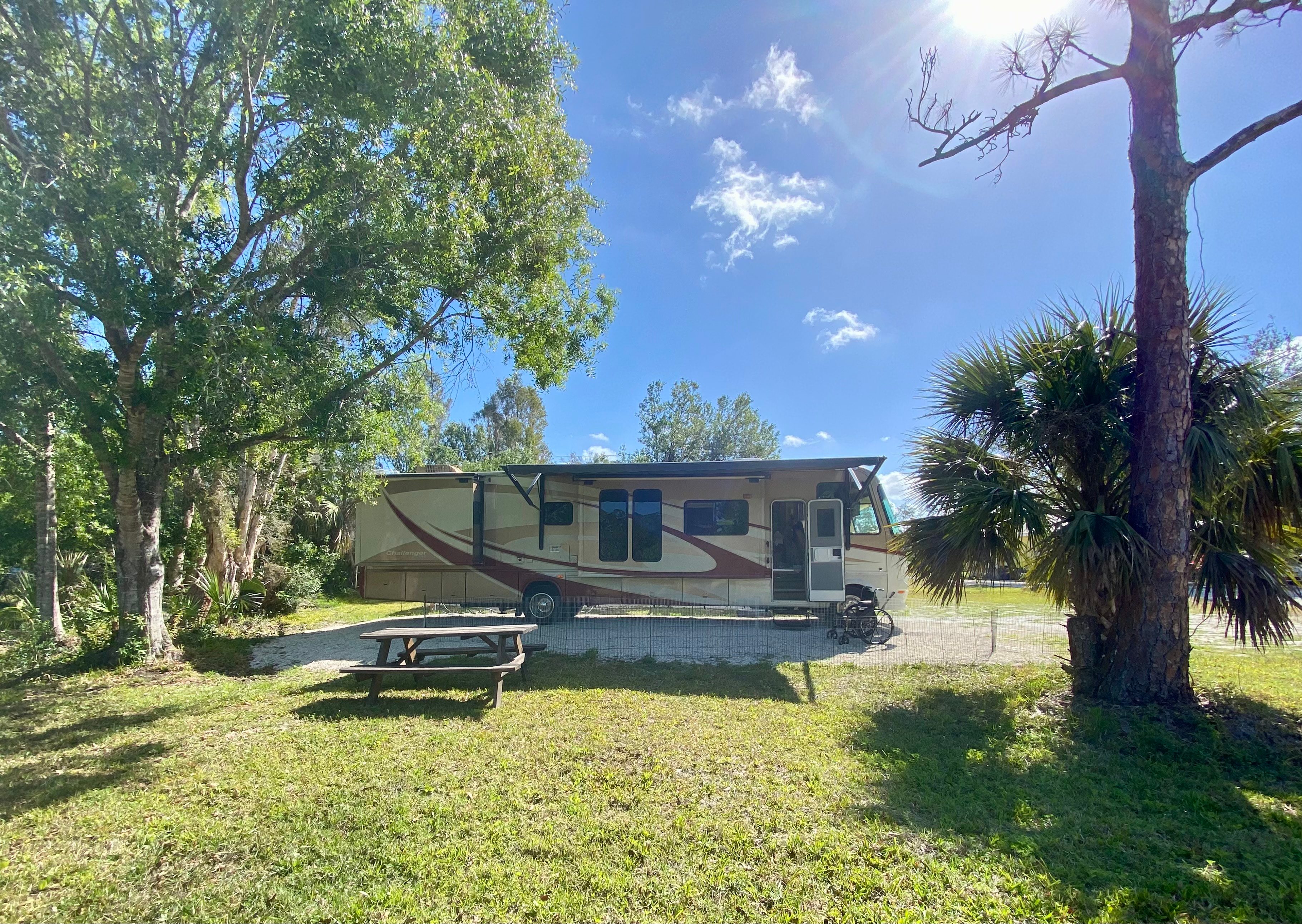 View of site #2 with a 38 ft motor home on a beautiful sunny day!