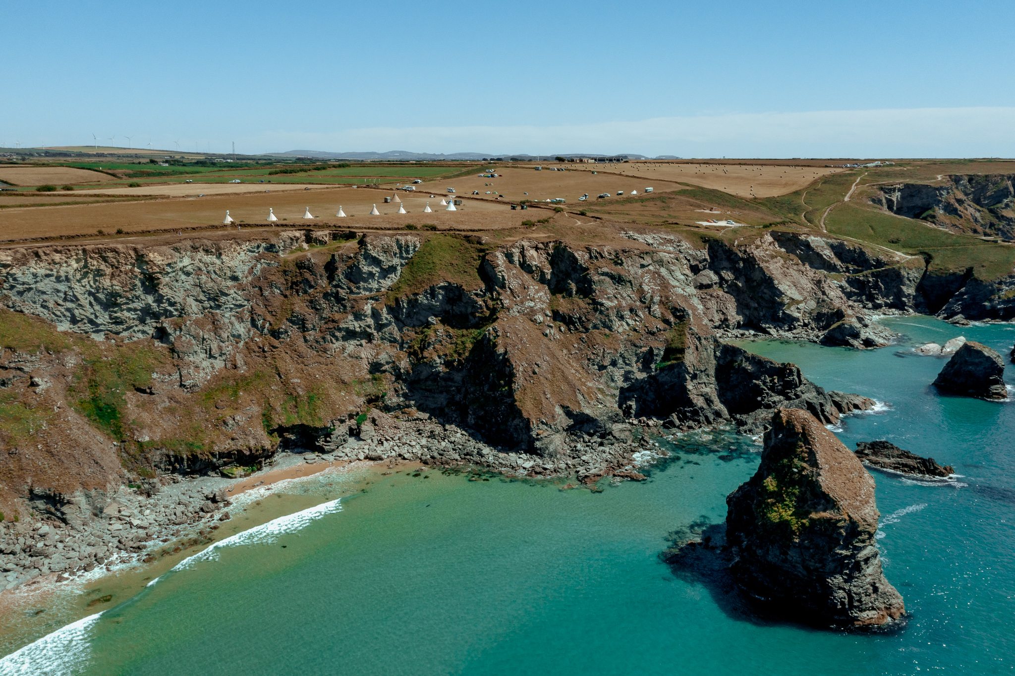 Bedruthan Steps below the tipis.