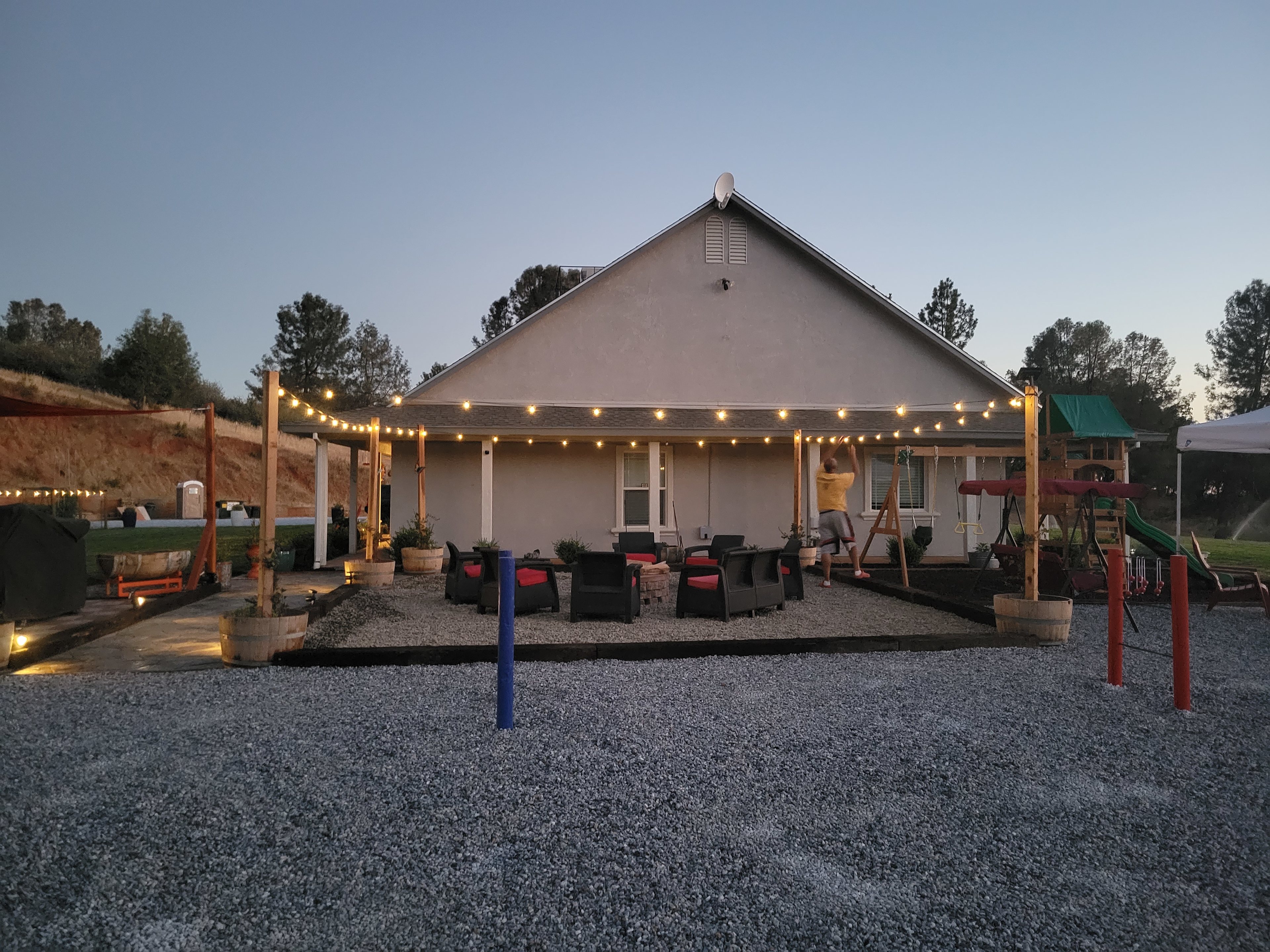 Back of property with fire pit, ladder ball, and horseshoe pits. Bocci ball and cornhole also available!