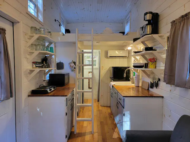 'We are used to small spaces so the tiny home was easy."-Emily Sept2025