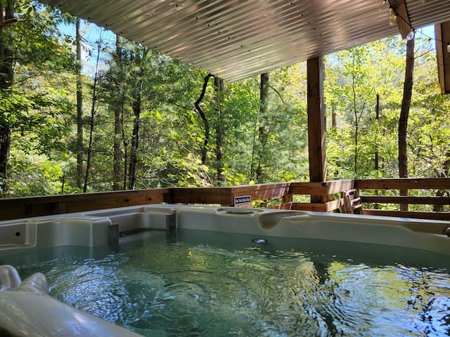 "Once we got there the place was so secluded, and included all the amenities I paid for. My favorite part was the hot tub on the balcony, where we could watch all the fireflies and talk throughout the evening." -Virginia May 2025
