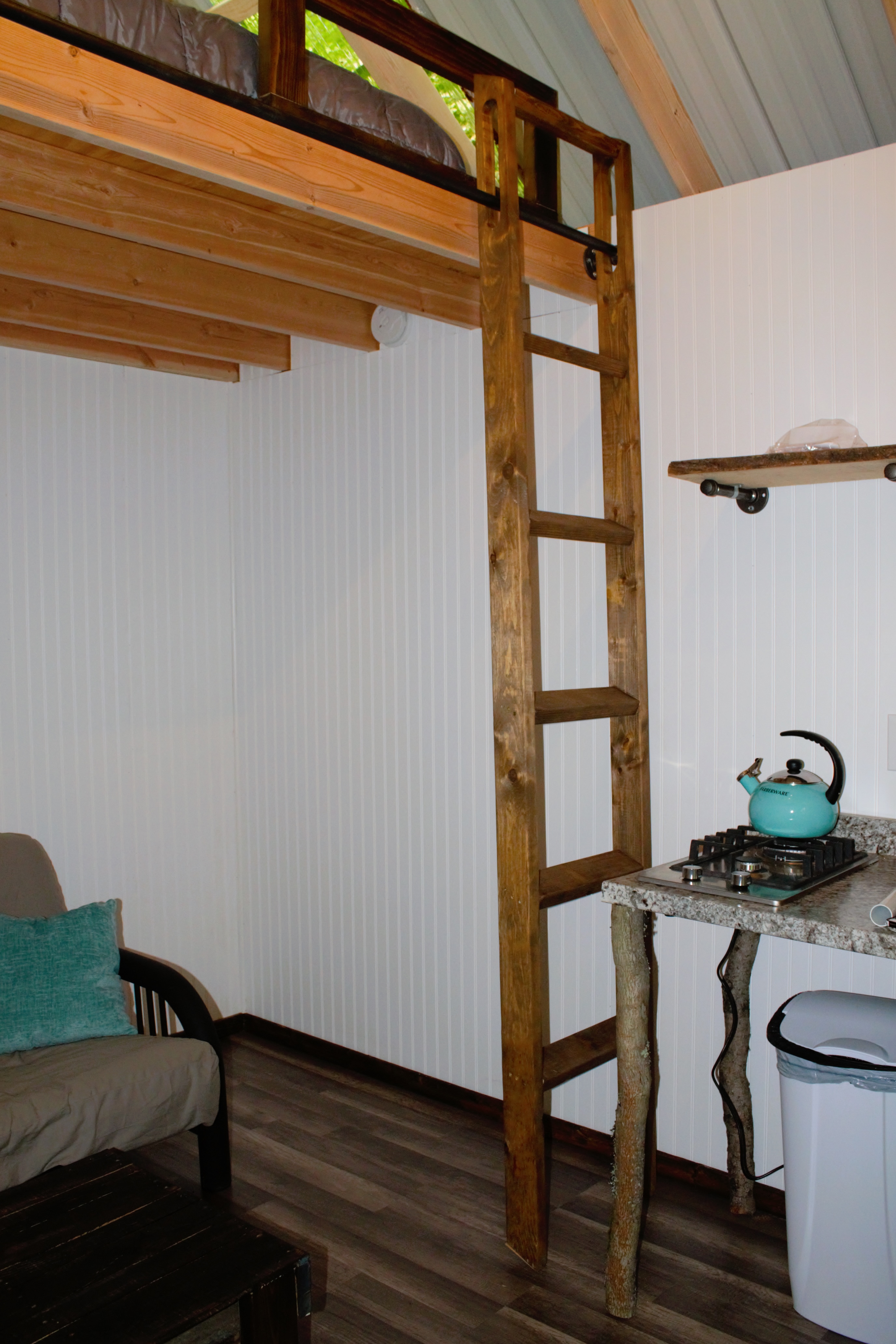 Ladder to loft in stored position