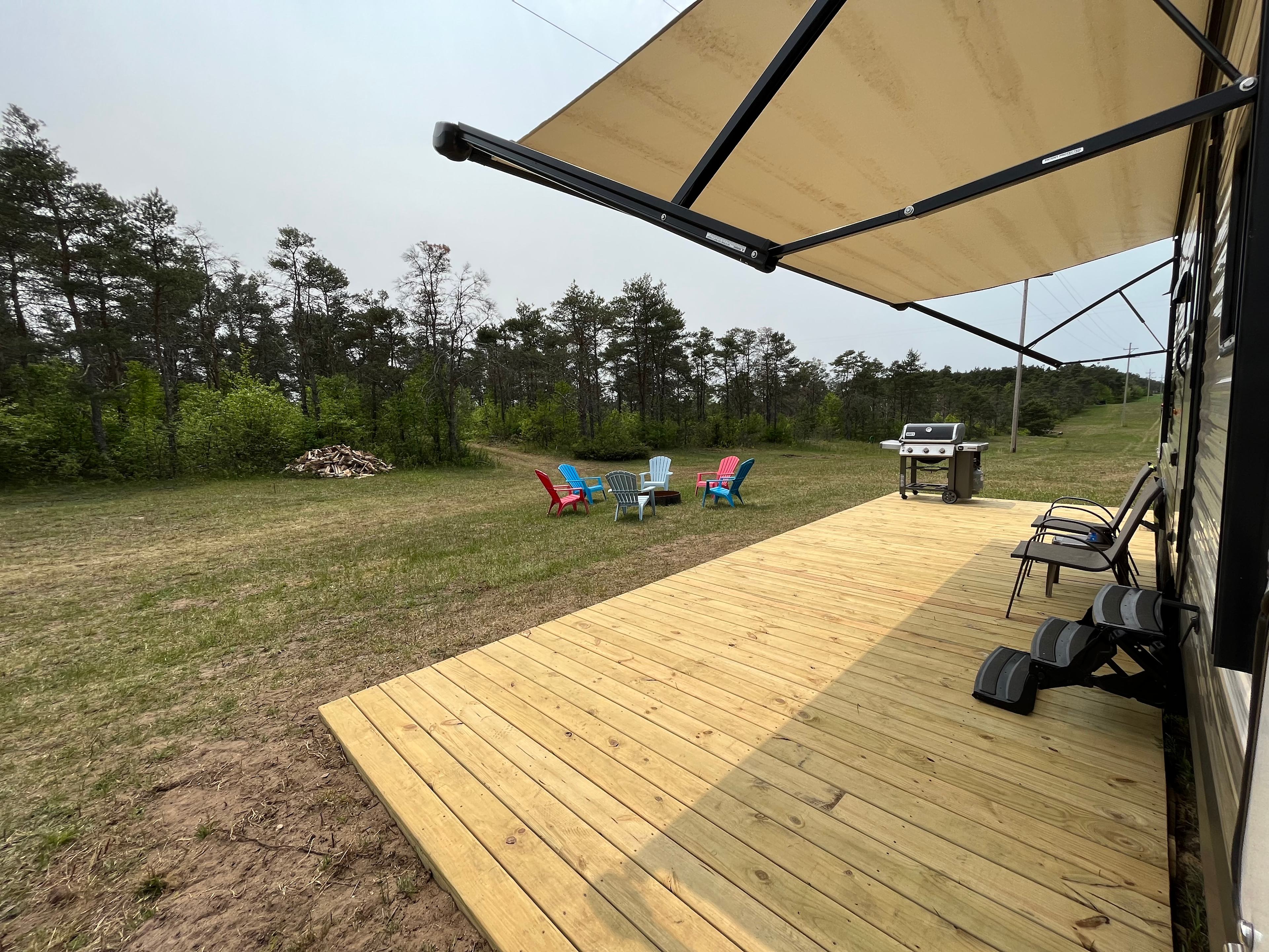 Private campsite with camper