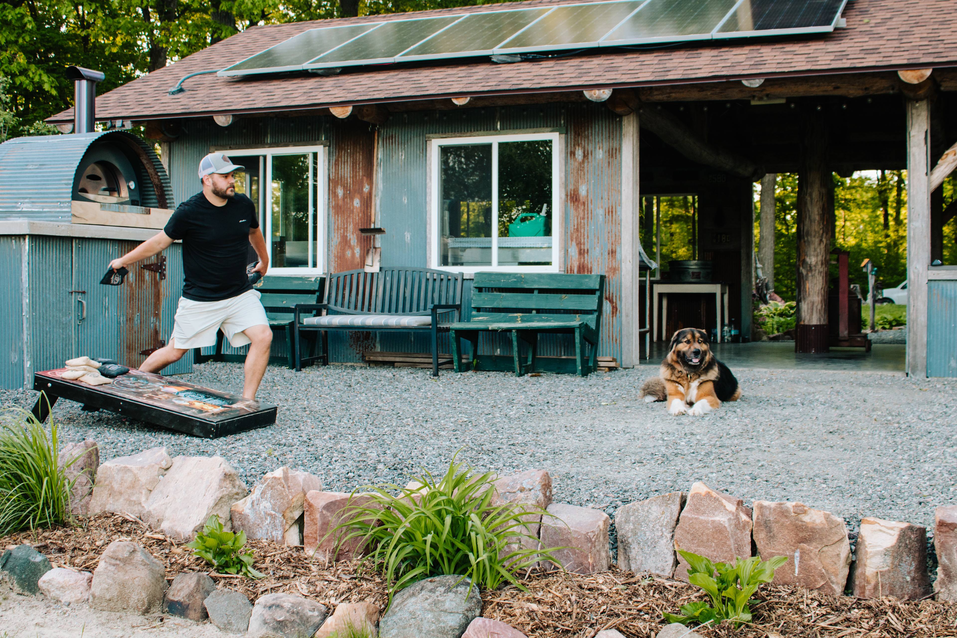 The hosts provide board games and corn hole