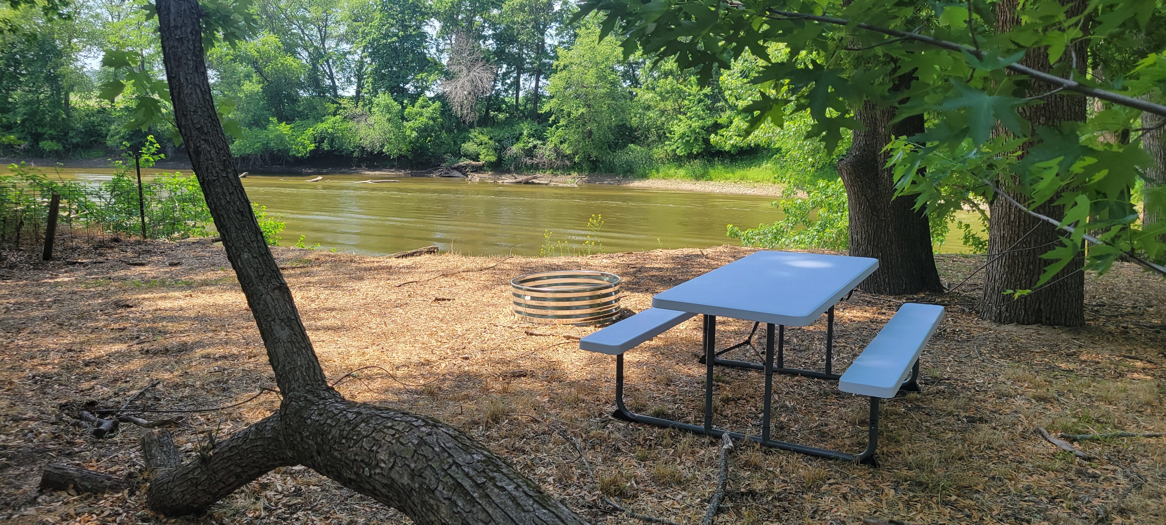 Plenty of space for a large tent and waters edge for fishing.