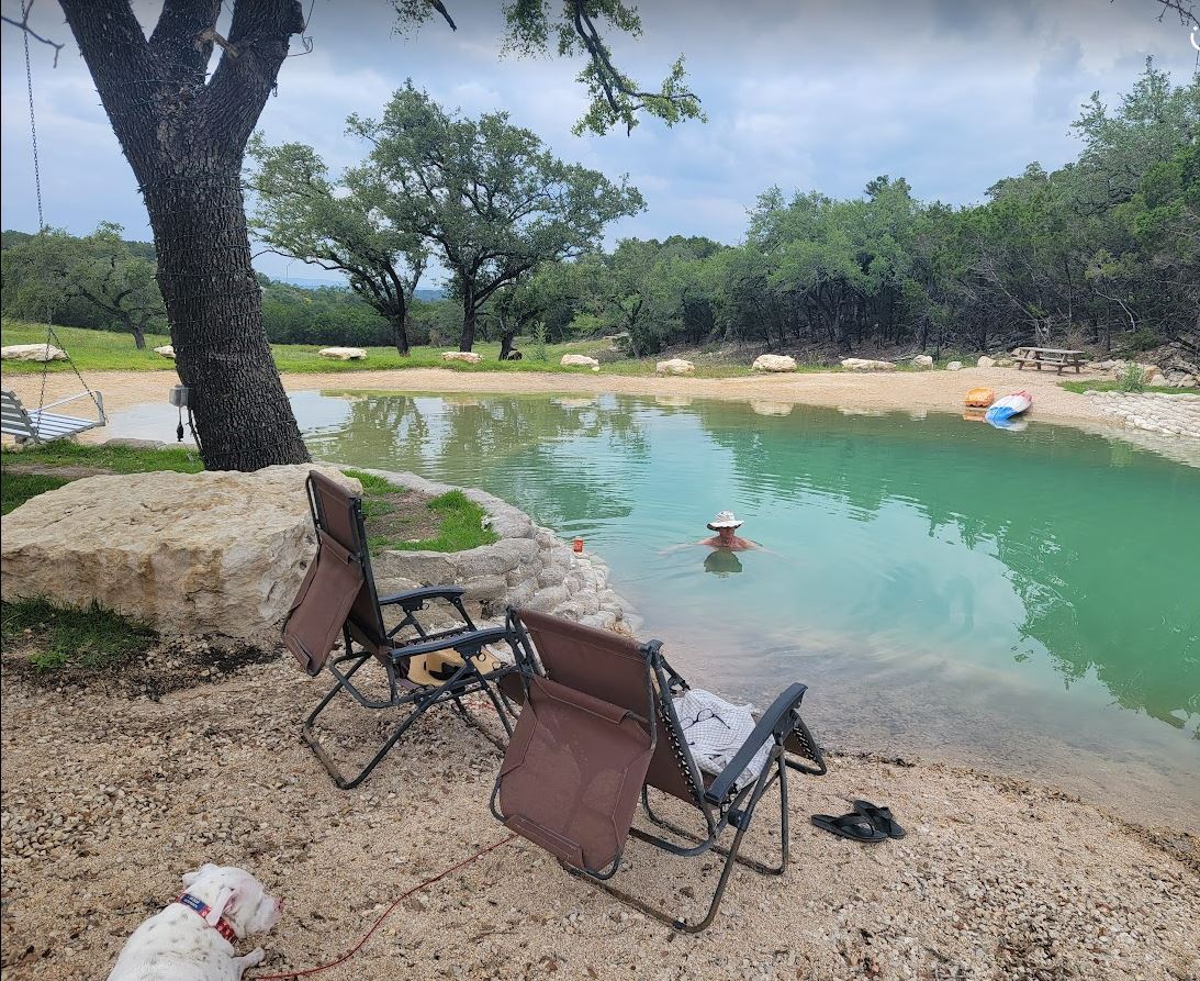 Shared freshing swimming hole downhill from camping spot