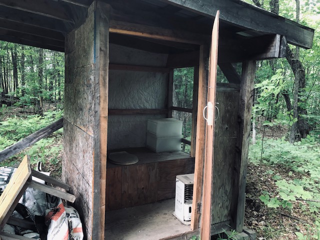 Outhouse, screen protected. 