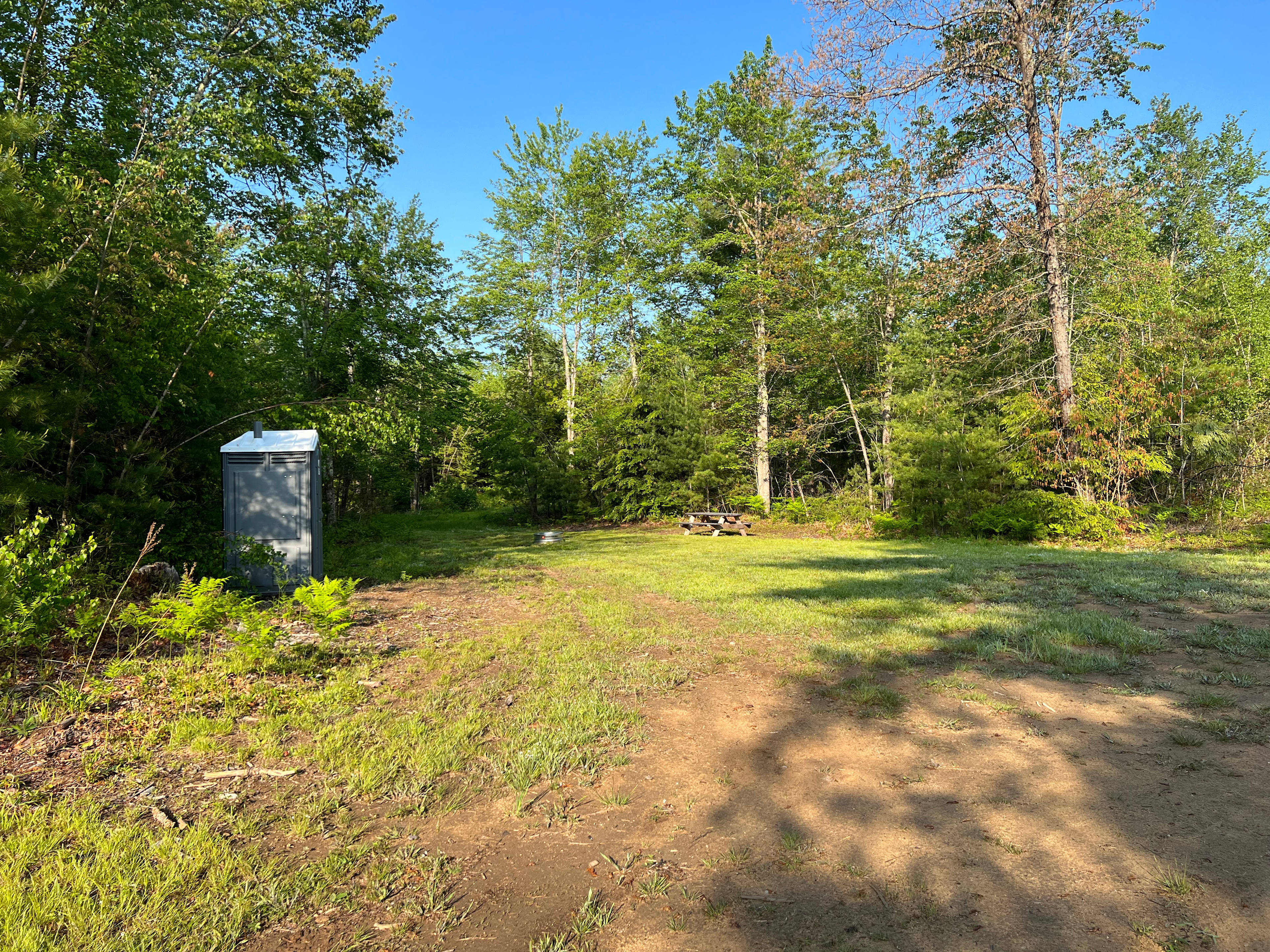 Site #1 -RV or bring your own tent/camper. Open site with picnic table, firepit and chemical toilet