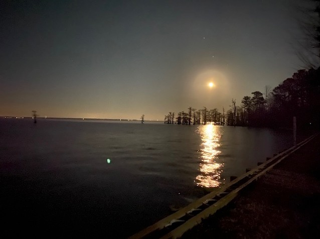A winter evening - February if I remember correctly. (ice on the breakwater). The lights across the Sound are in Chowan County. 