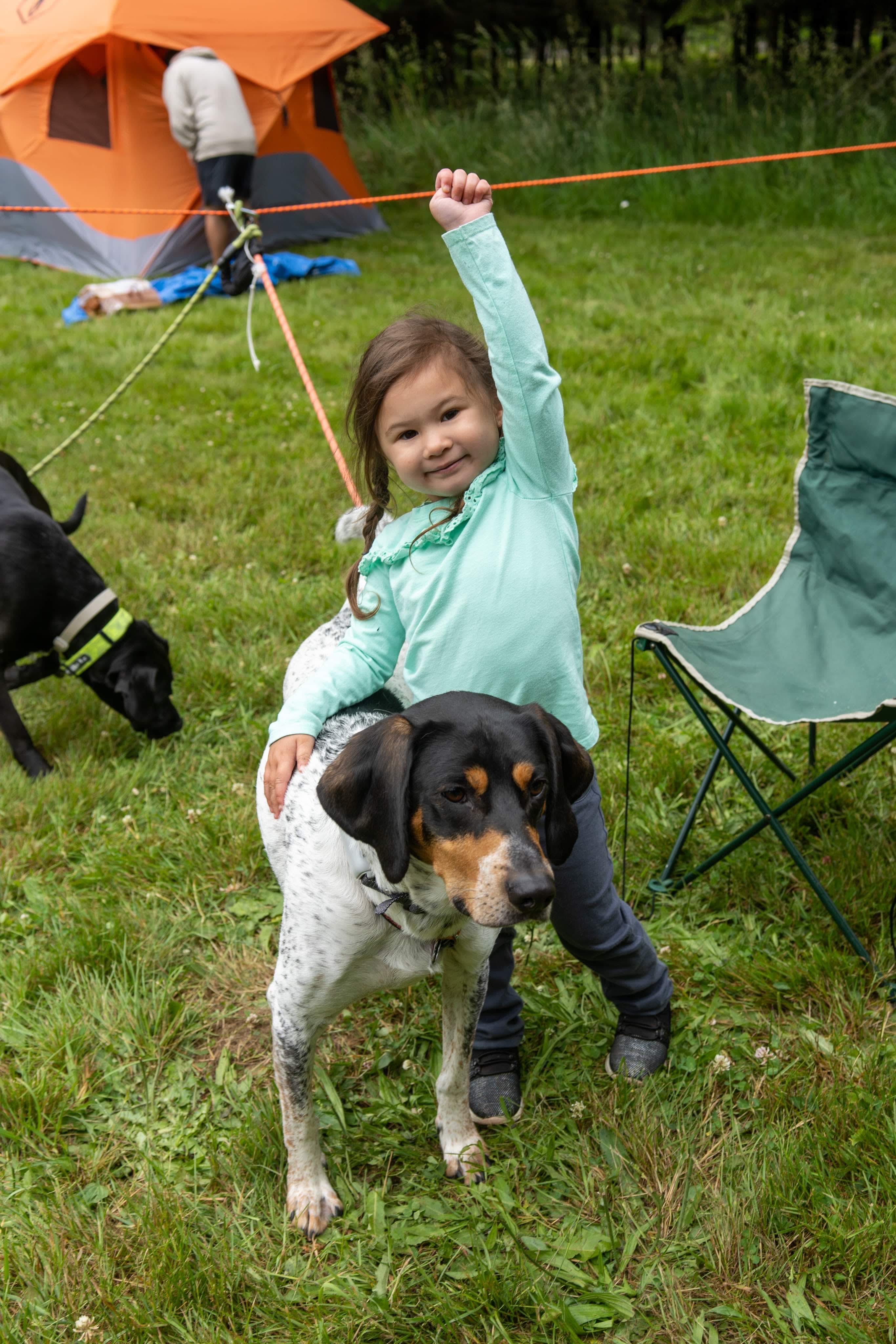 Happy (first time) camper with the doggies. 