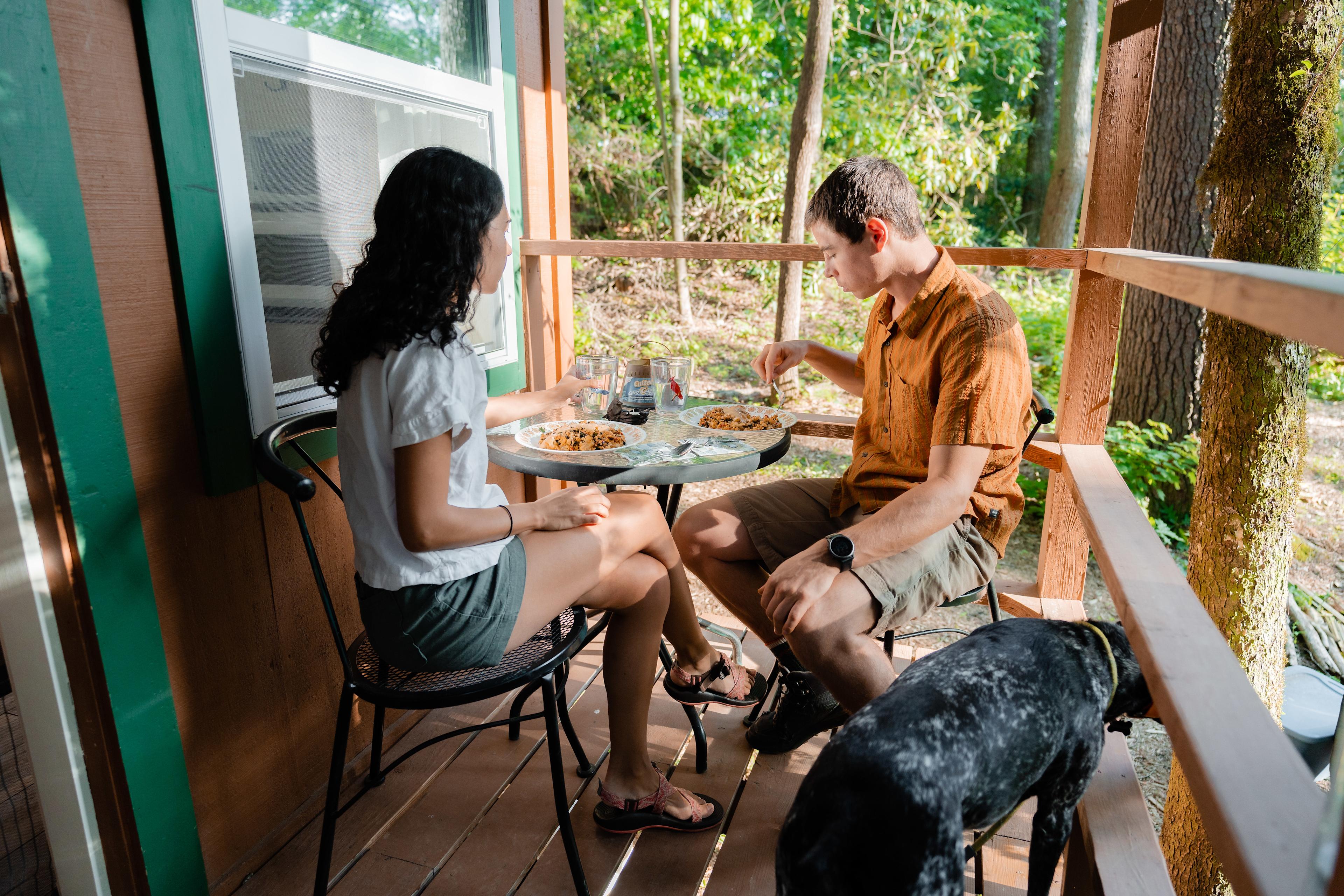 Dinner on the porch. Plates, cups, and utensils are provided