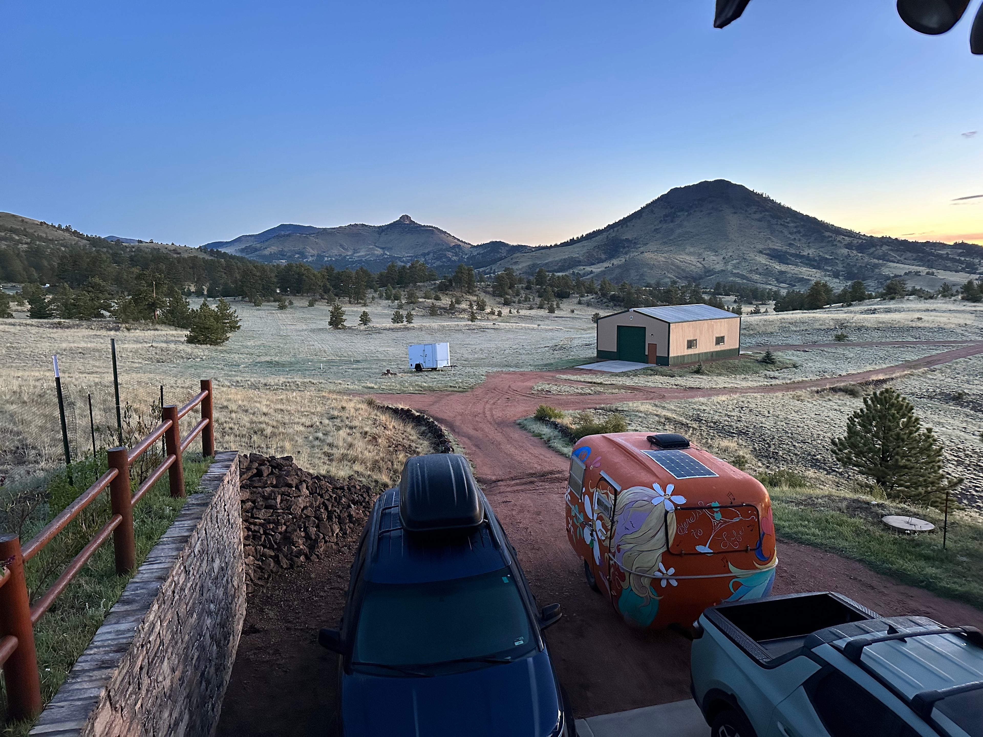 This campsite is on the cement pad near the garage. Electricity available here.