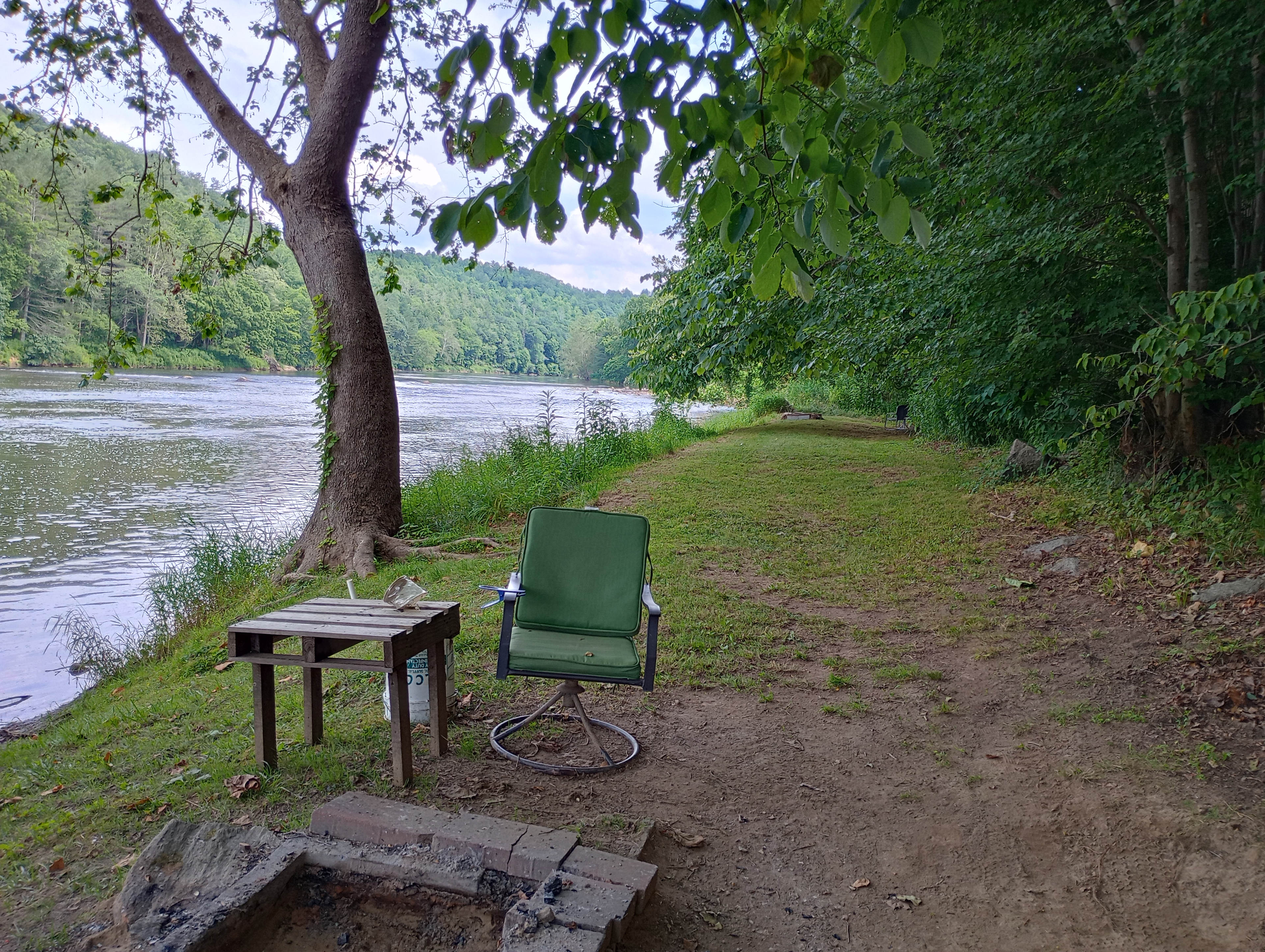 One camp spot with the neighboring  camp spot at the end. These spots are 70 yards apart.