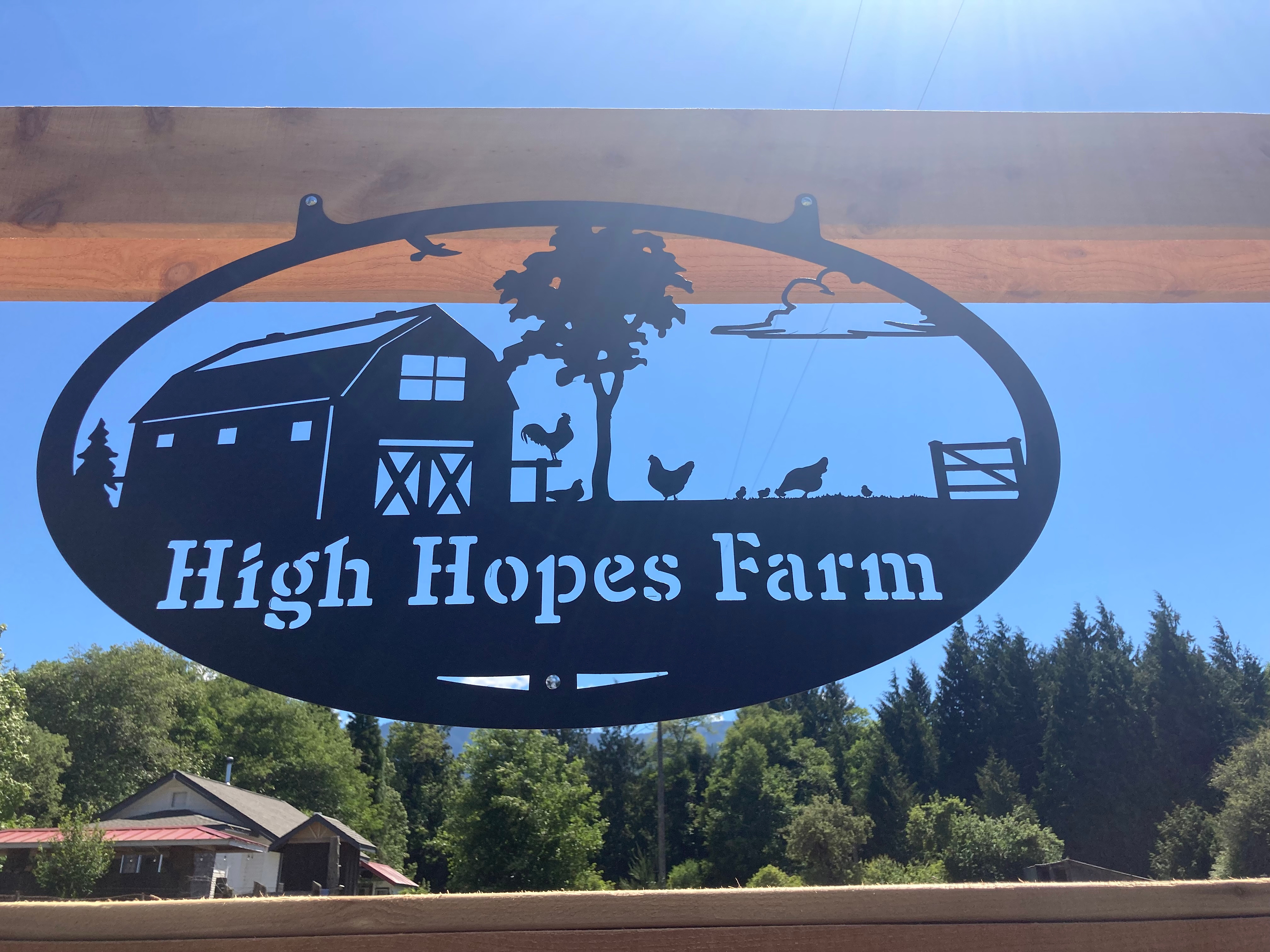 Sign on fence at entrance.  