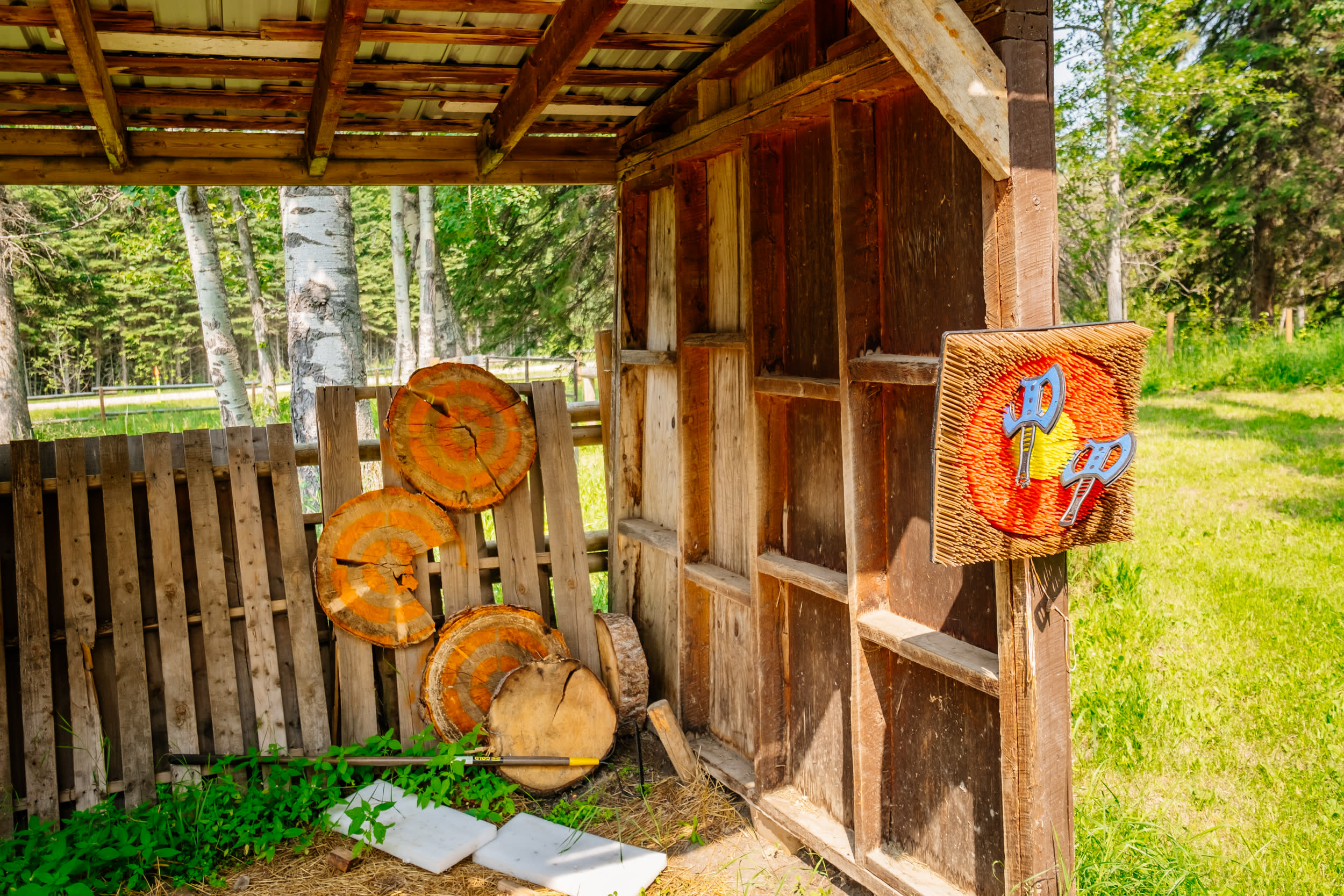 Future adult axe throwing area next to the kids' axe throwing area.