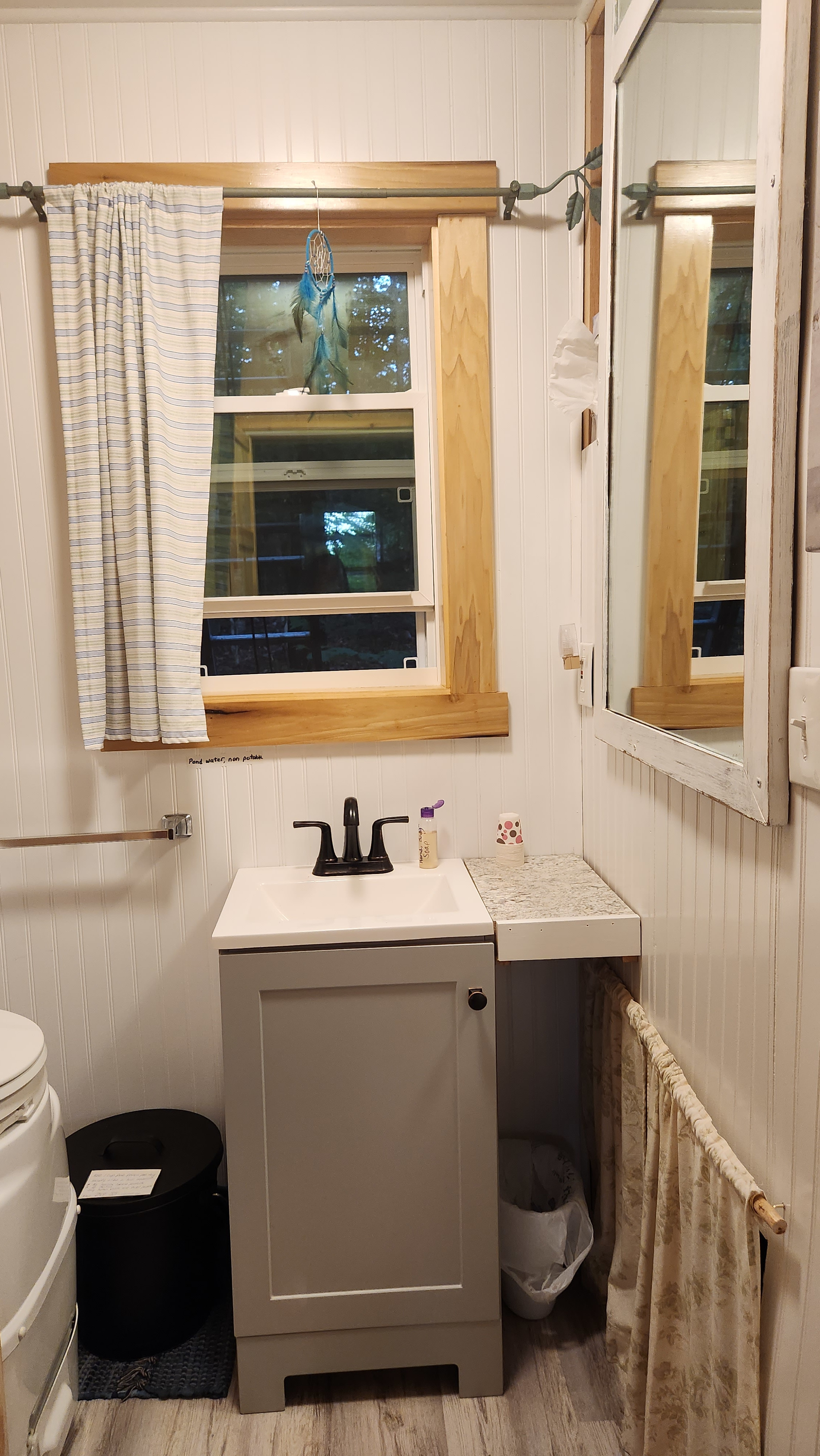 Toilet and sink, outdoor  enclosed shower,  composting  toilet 