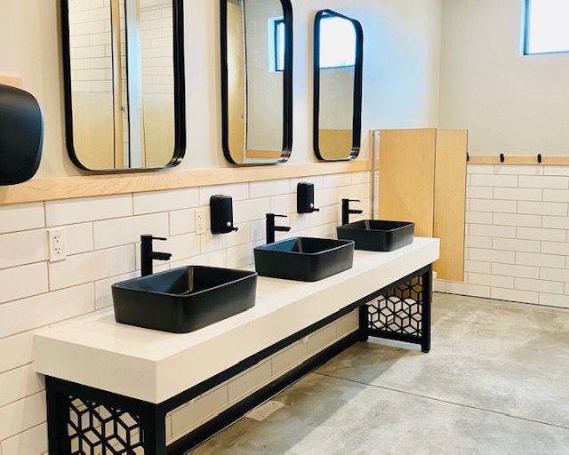 Shower houses and restrooms located on the backside of our property. 