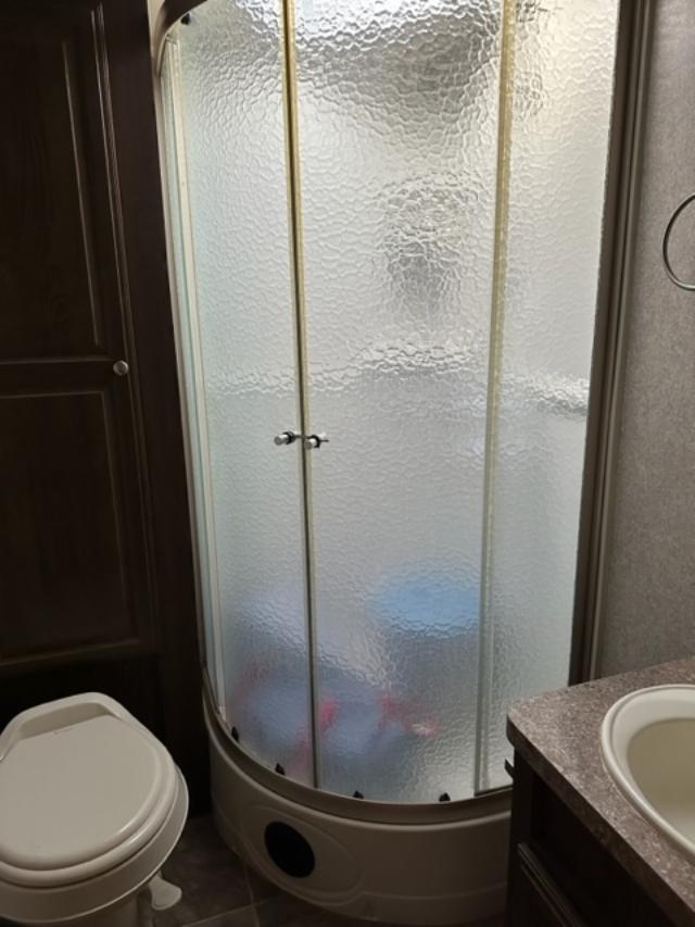 bathroom aka "storage." We prefer that you would shower in the bath house.