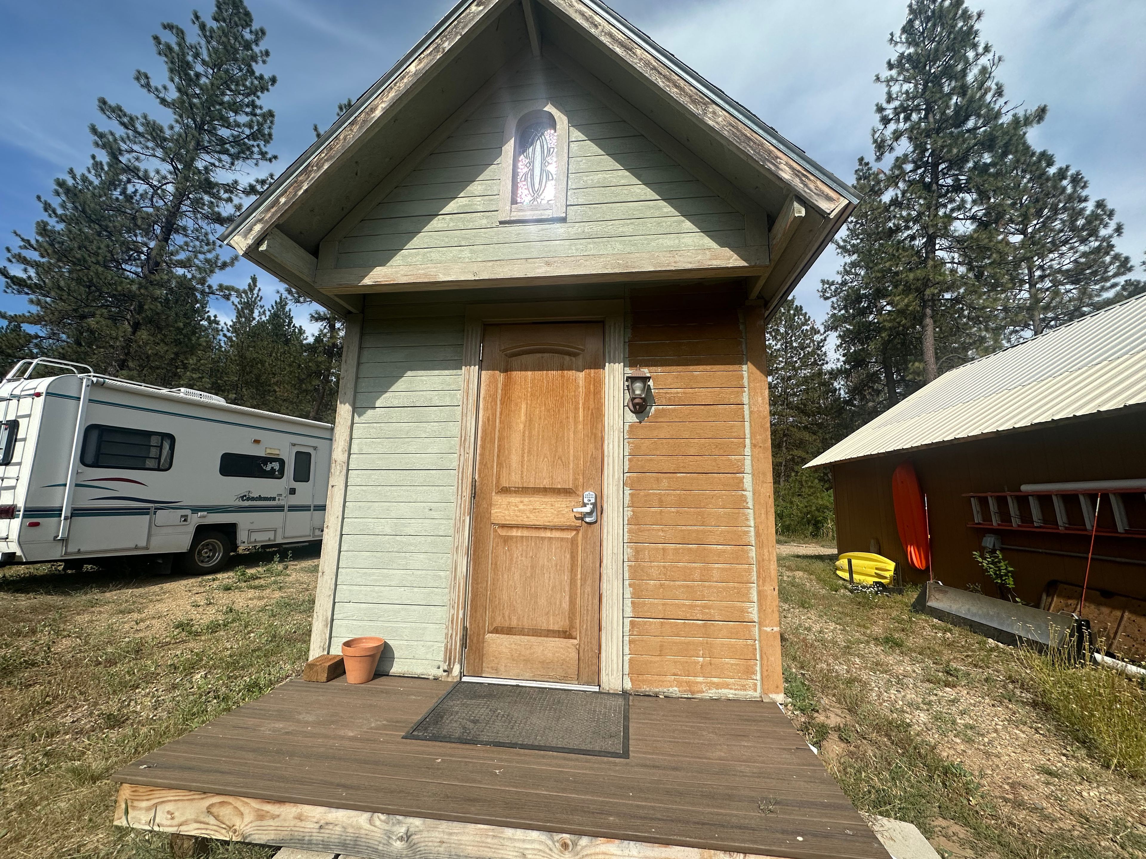 House is next to our garage.  Maybe we'll finish painting someday!