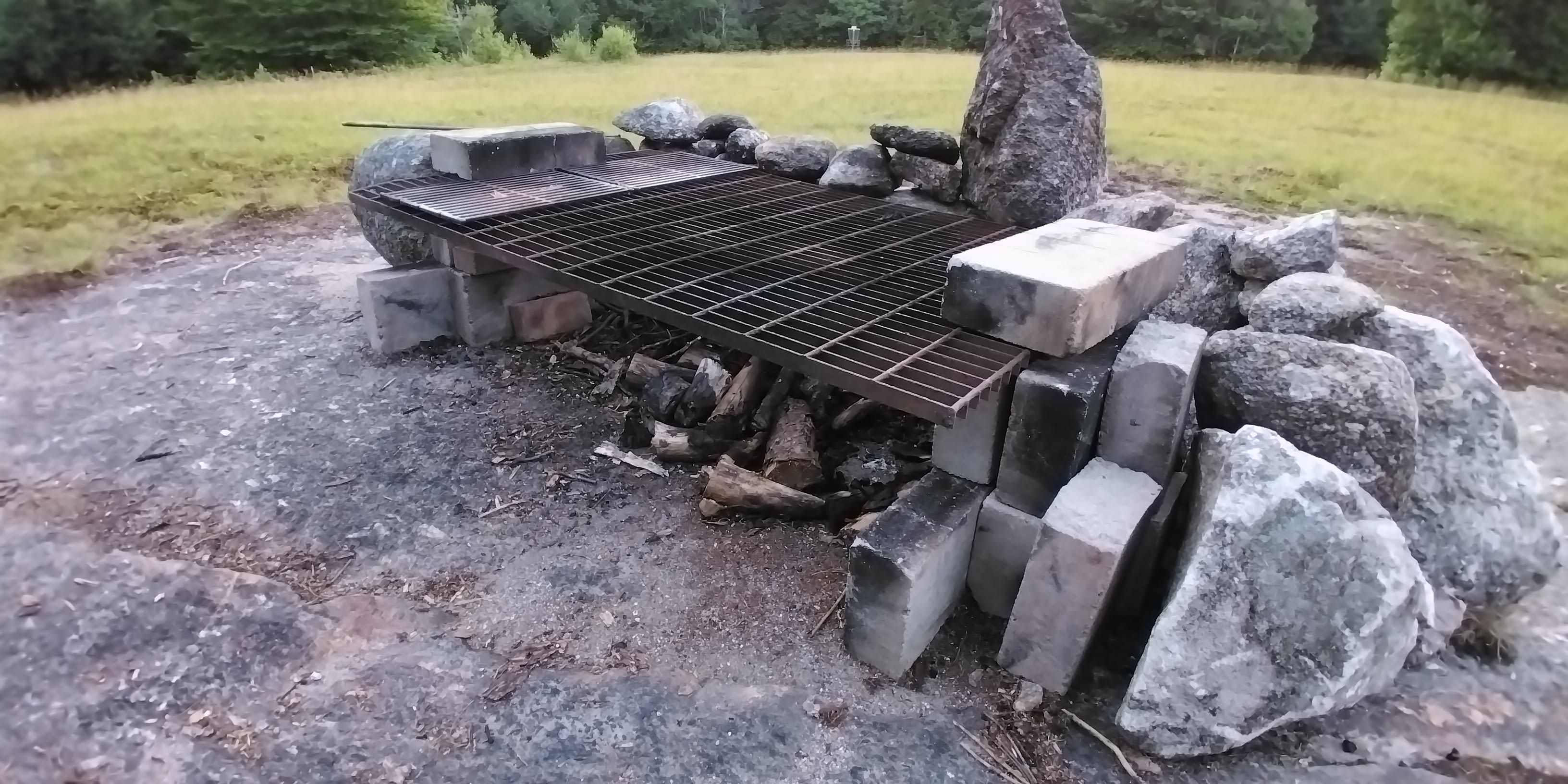 Plenty of cooking space and a safe spot to enjoy a campfire! 