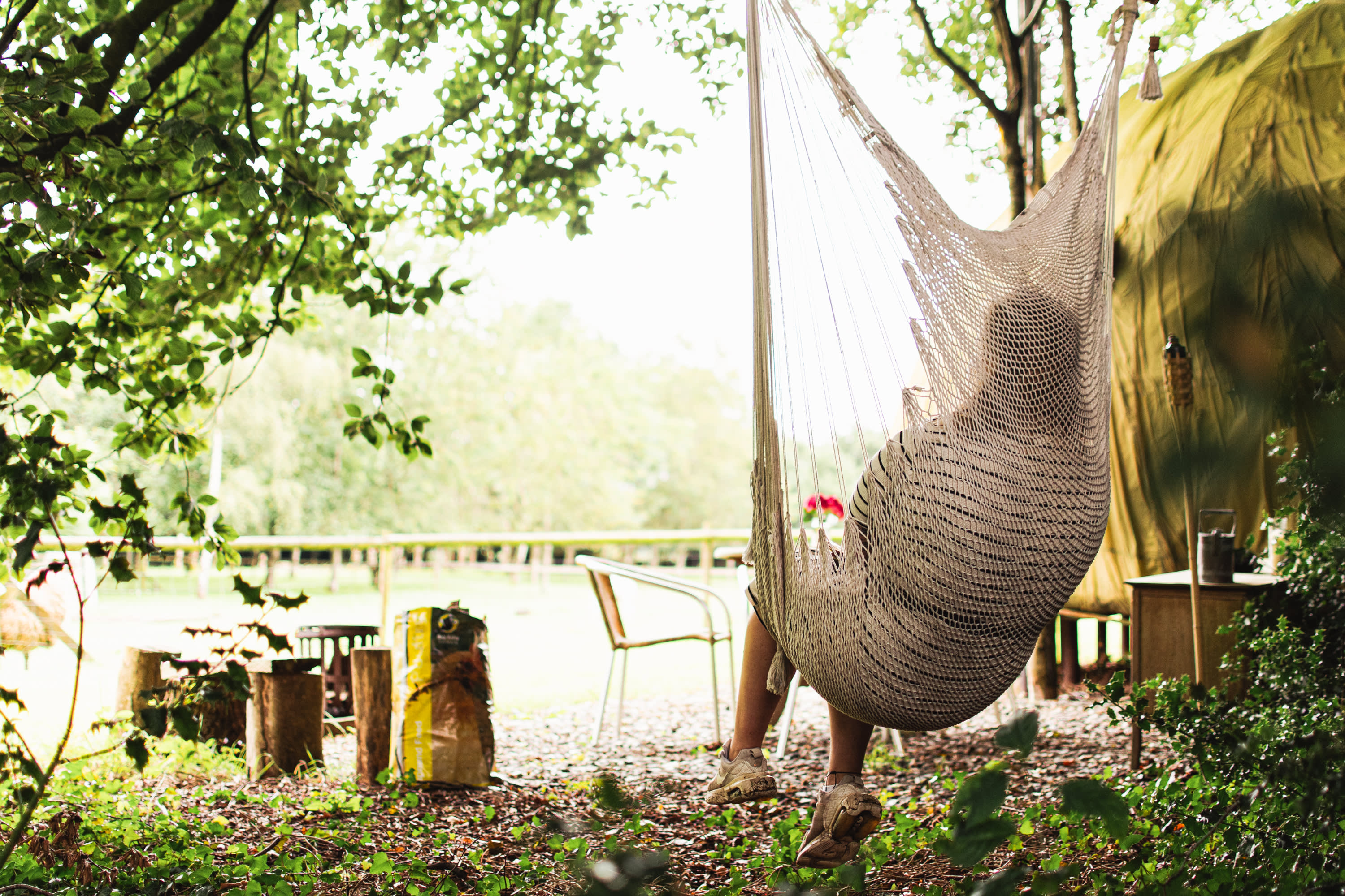 Enjoying the view from a hammock swing in the outdoor area for the dome