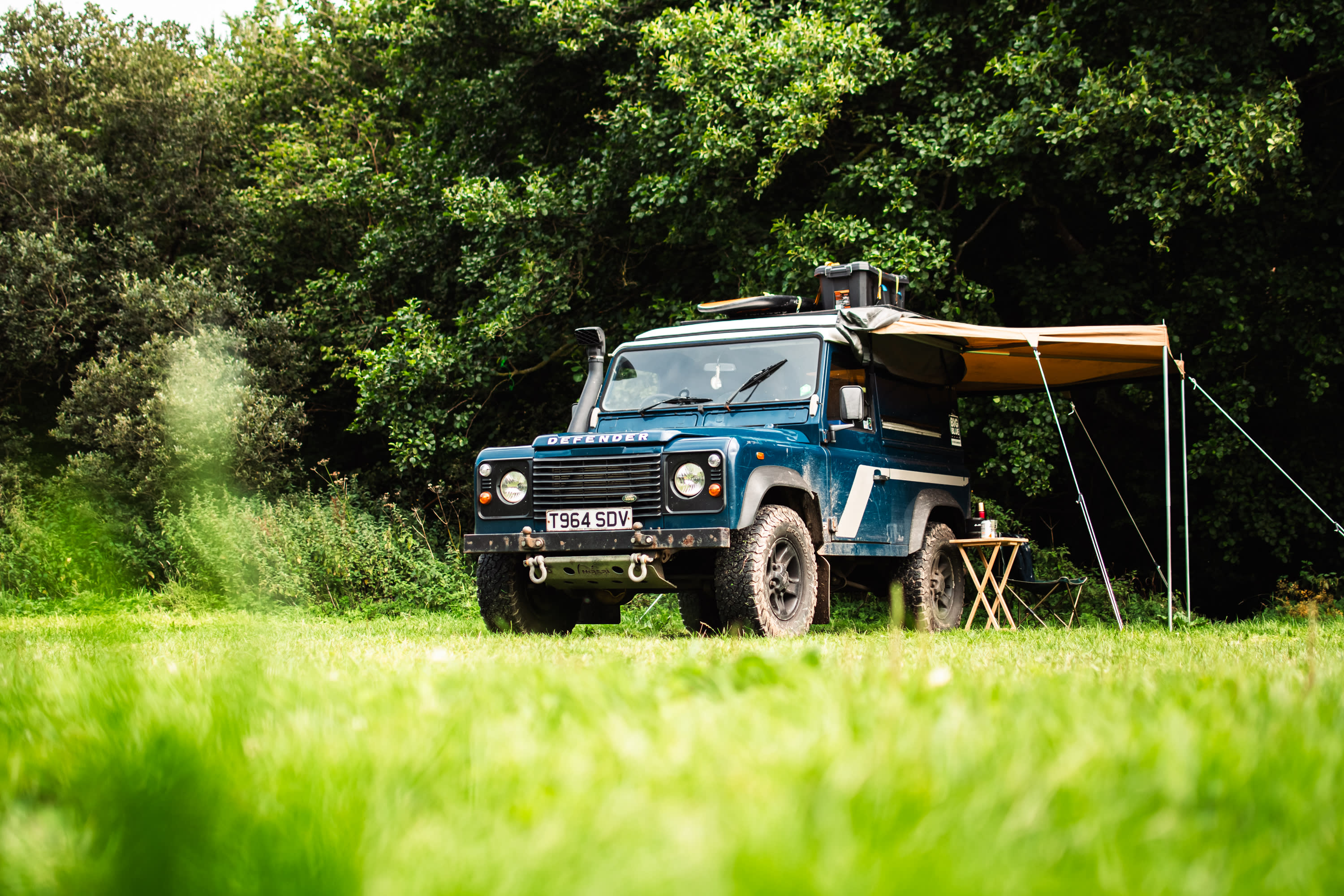 Camp set up in a corner of the field