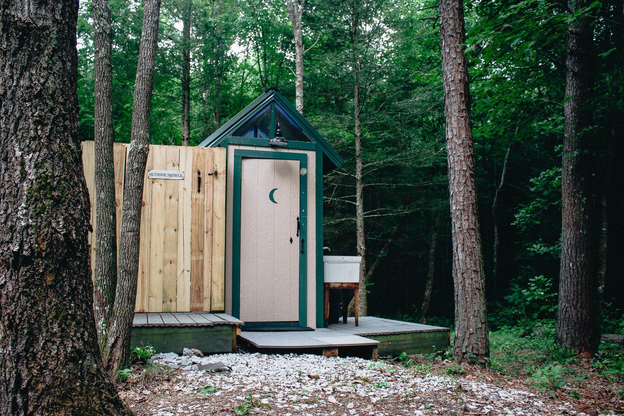 The cutest outhouse and shower.