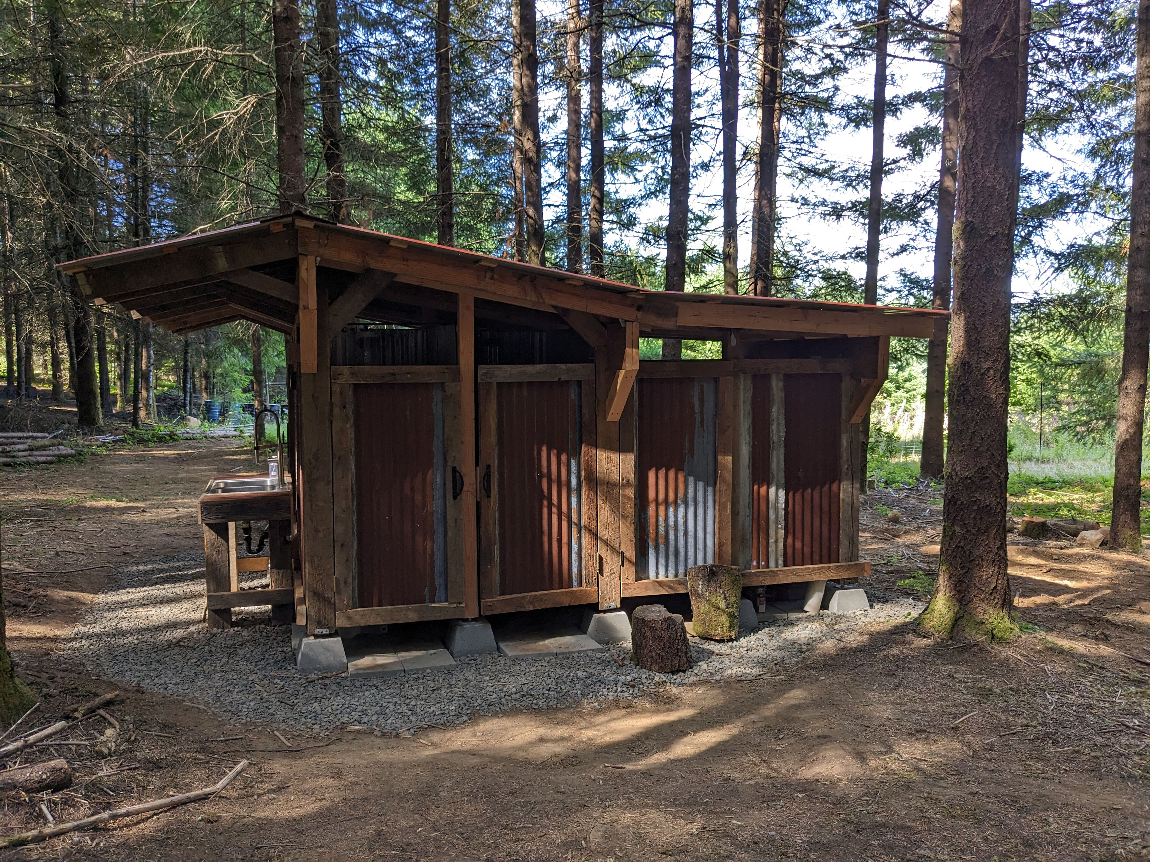 Two hot showers and a toilet room!