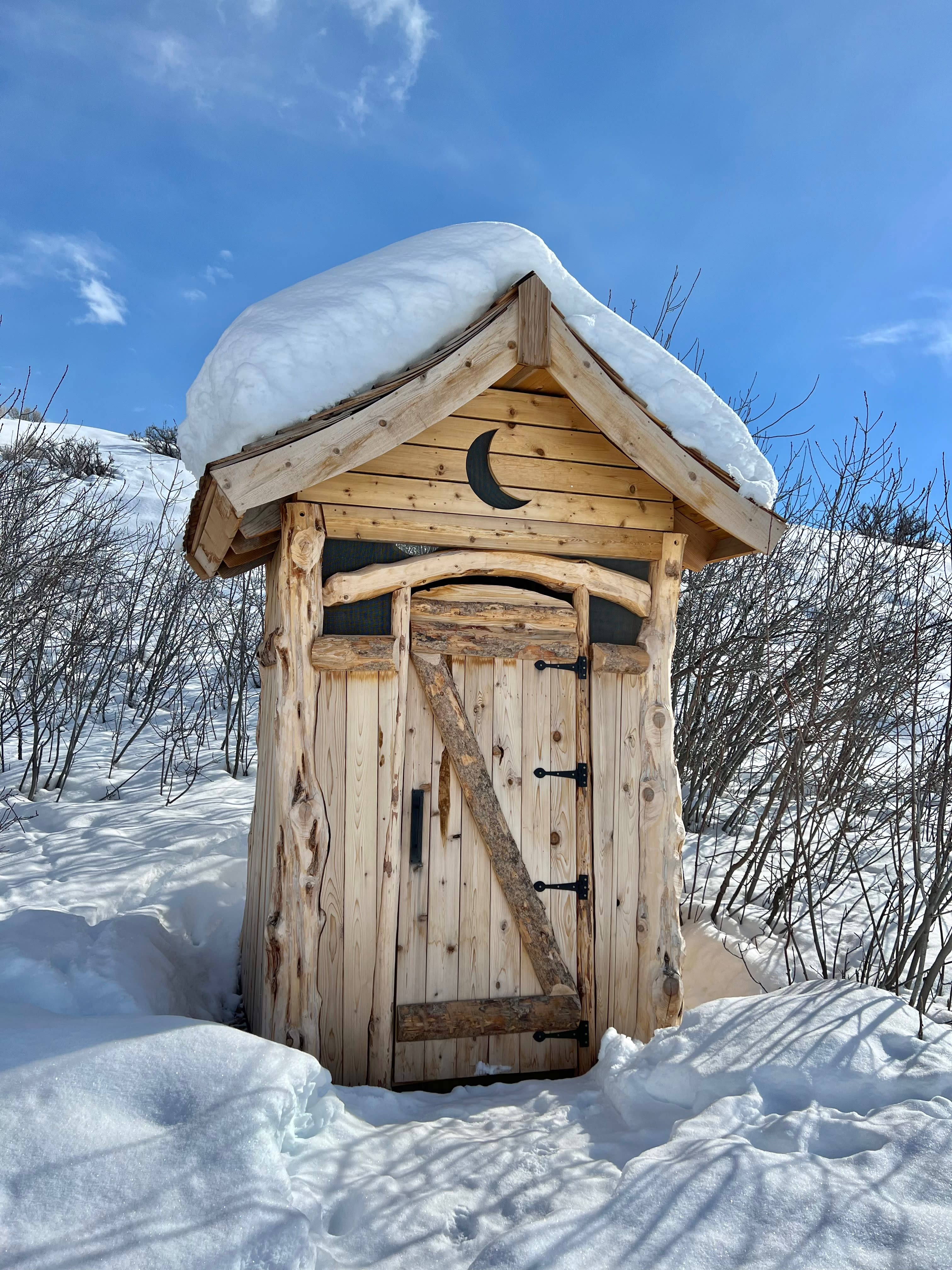 Of all features at the yurt, we are most proud of (and also most in love with) this little building right here: the outhouse. Possibly because we made it from scratch, spending days harvesting the wood, scribing the boards, bringing the vision to life. Possibly because it's a compost toilet that doesn't stink. Possibly because it is roomy and can double as a changing room. In any case, we hope you love it too!