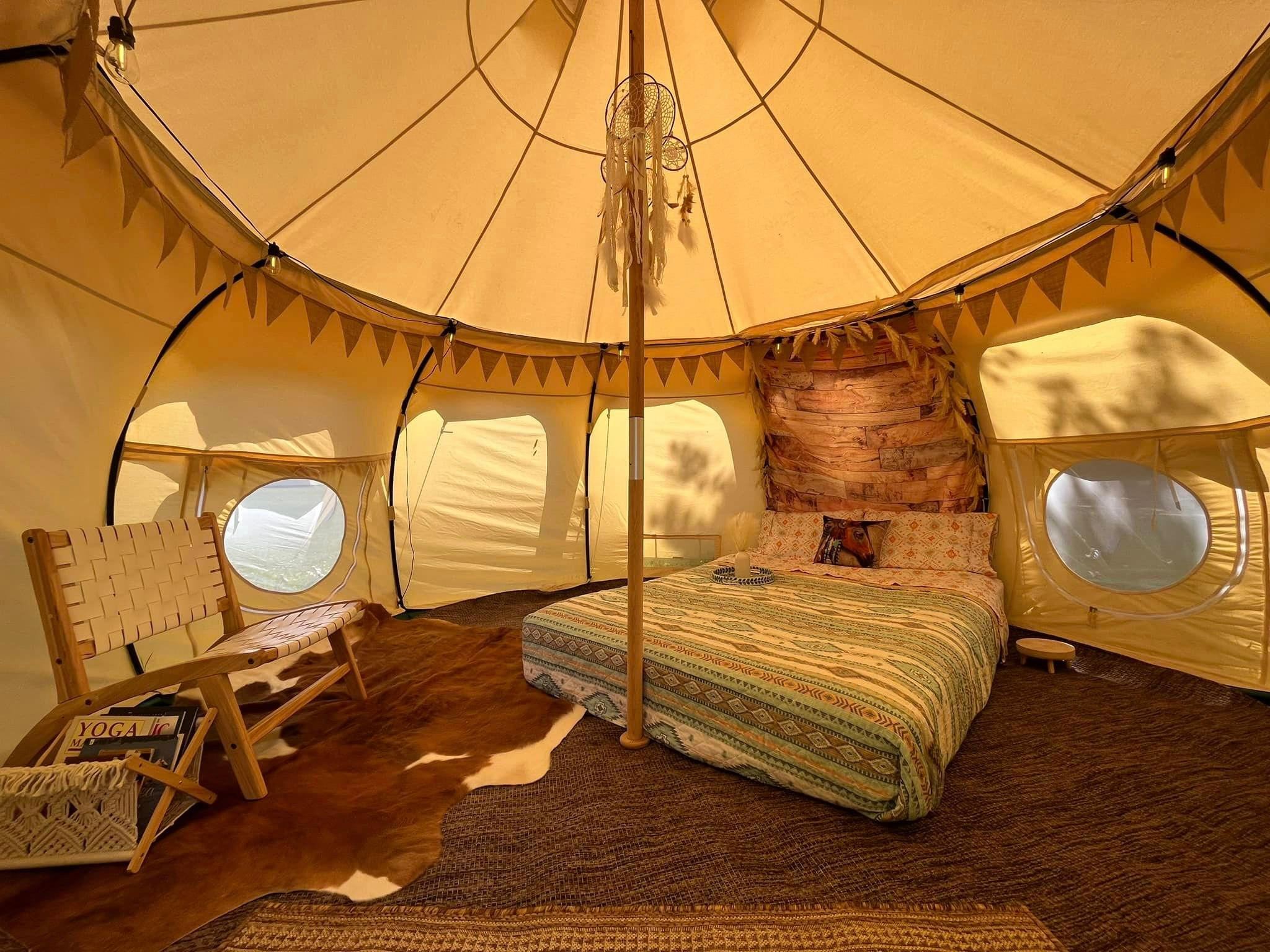 Enjoy a comfortable queen sized bed, reading area w/ books, electric fan, USB ports and free Wifi