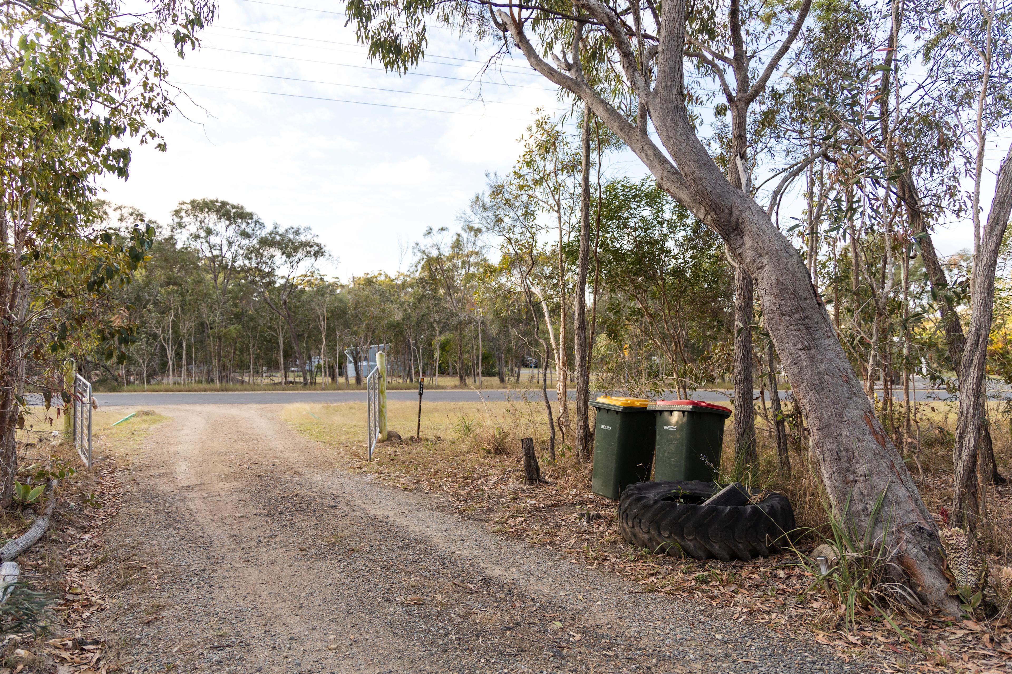 Garbage and recycling bins near the entrance