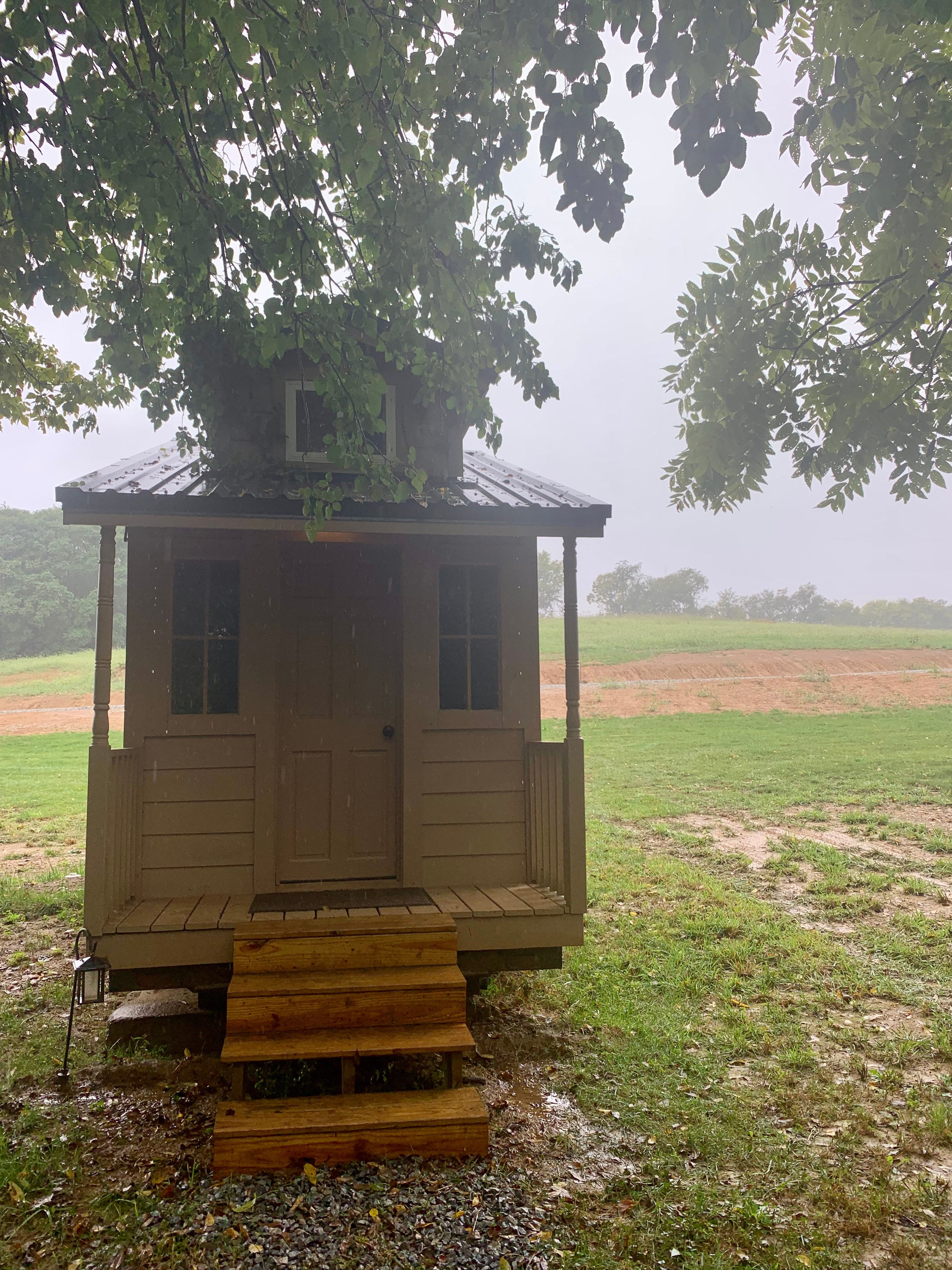Entrance facing the creek. 4 Steps
