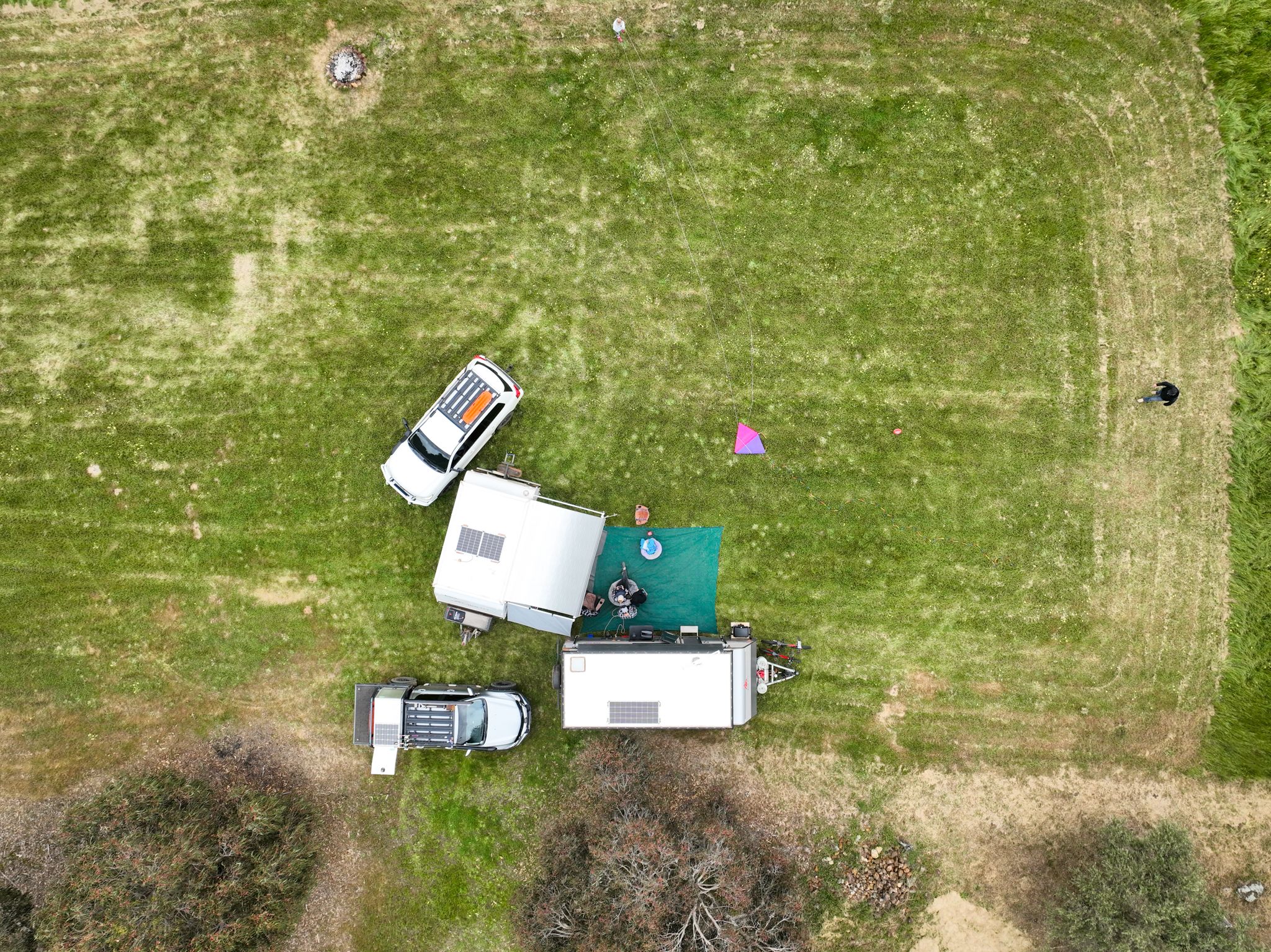 Large, grassy campsite from above.