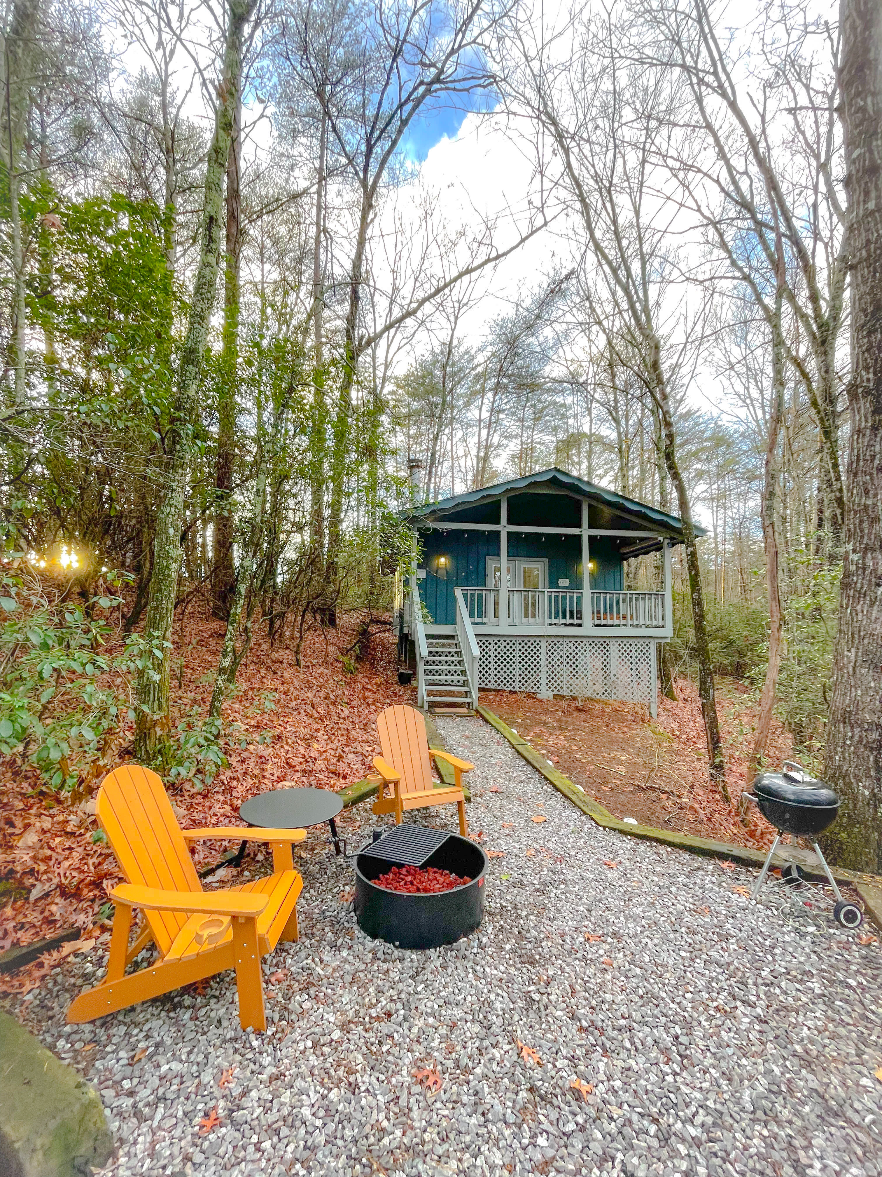 Boho romantic cabin in the woods. Exterior view of Adohi Cabin, a boho modern romantic getaway in North Georgia.