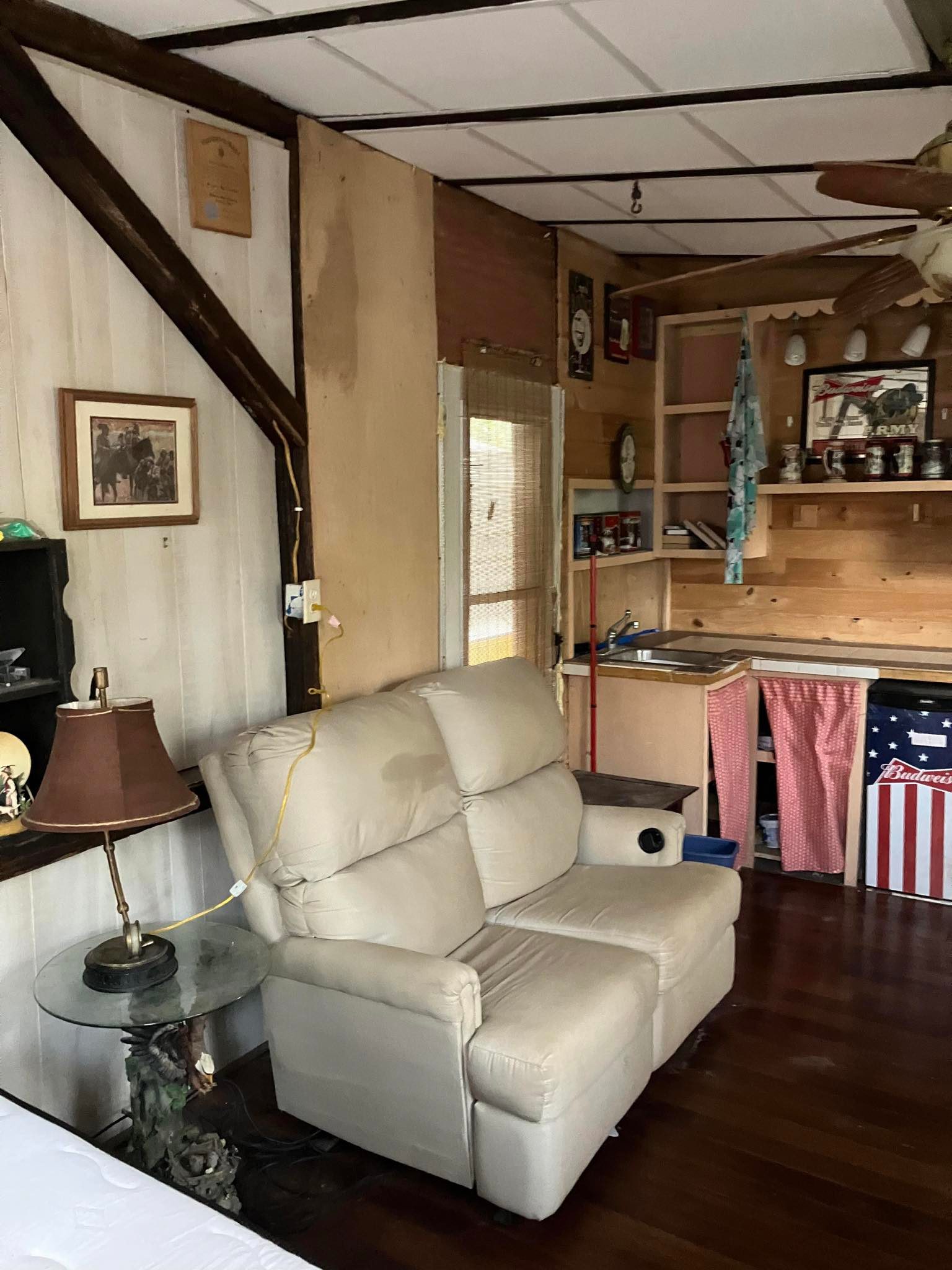 Dorm type fridge.  Plug fridge into the outlet when you arrive.  