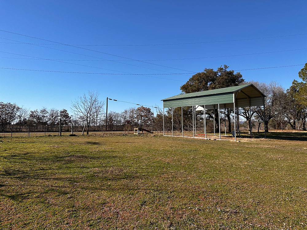 Entry gate to the left. Plenty of room to pull in and out.