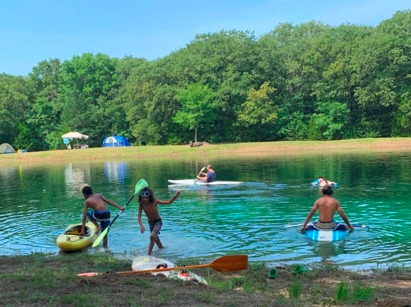 This is as good as it gets. People swimming, camping, playing, paddling and laughing. 